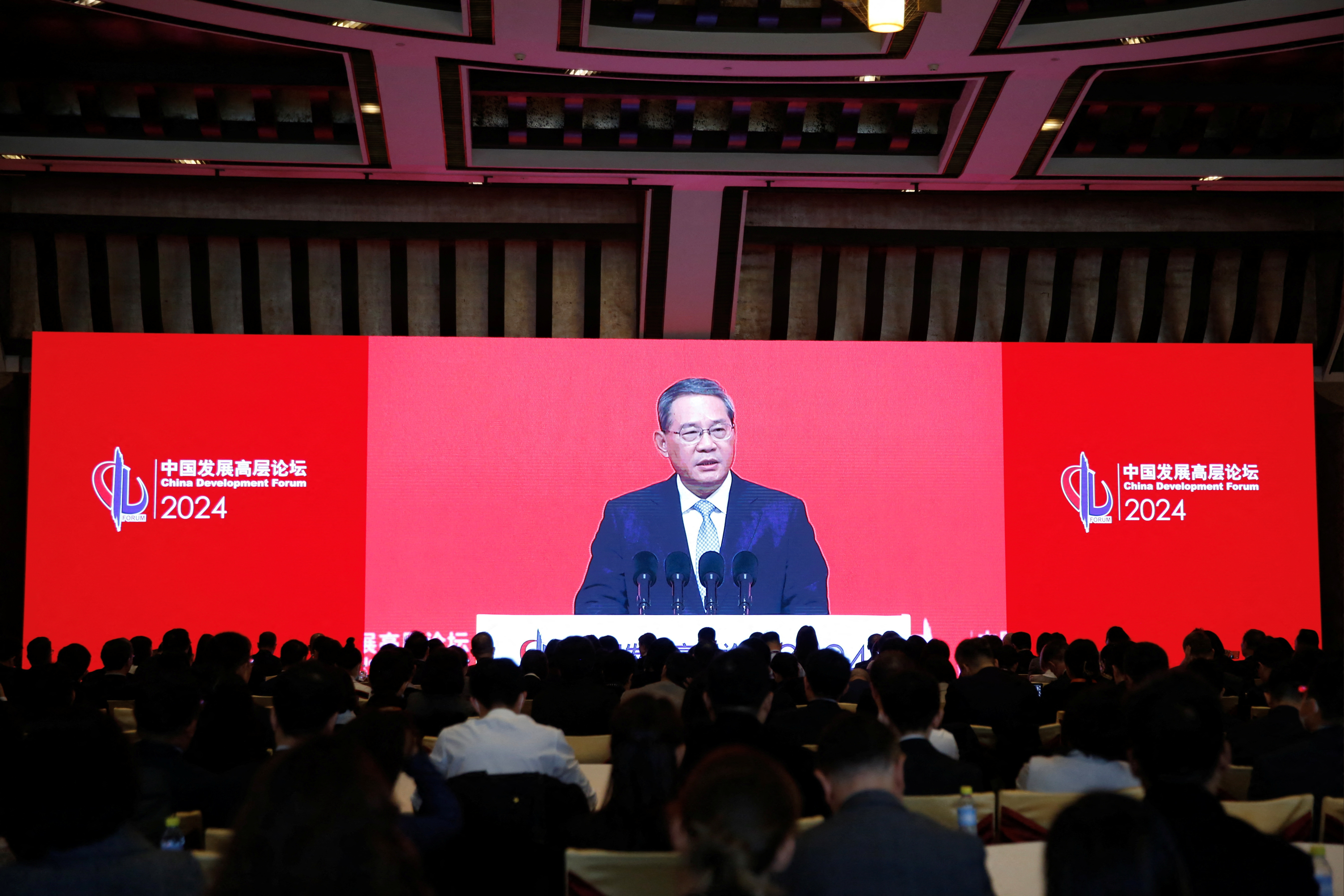 Screen shows Chinese Premier Li Qiang delivering a speech at the opening ceremony of China Development Forum (CDF) 2024, in Beijing