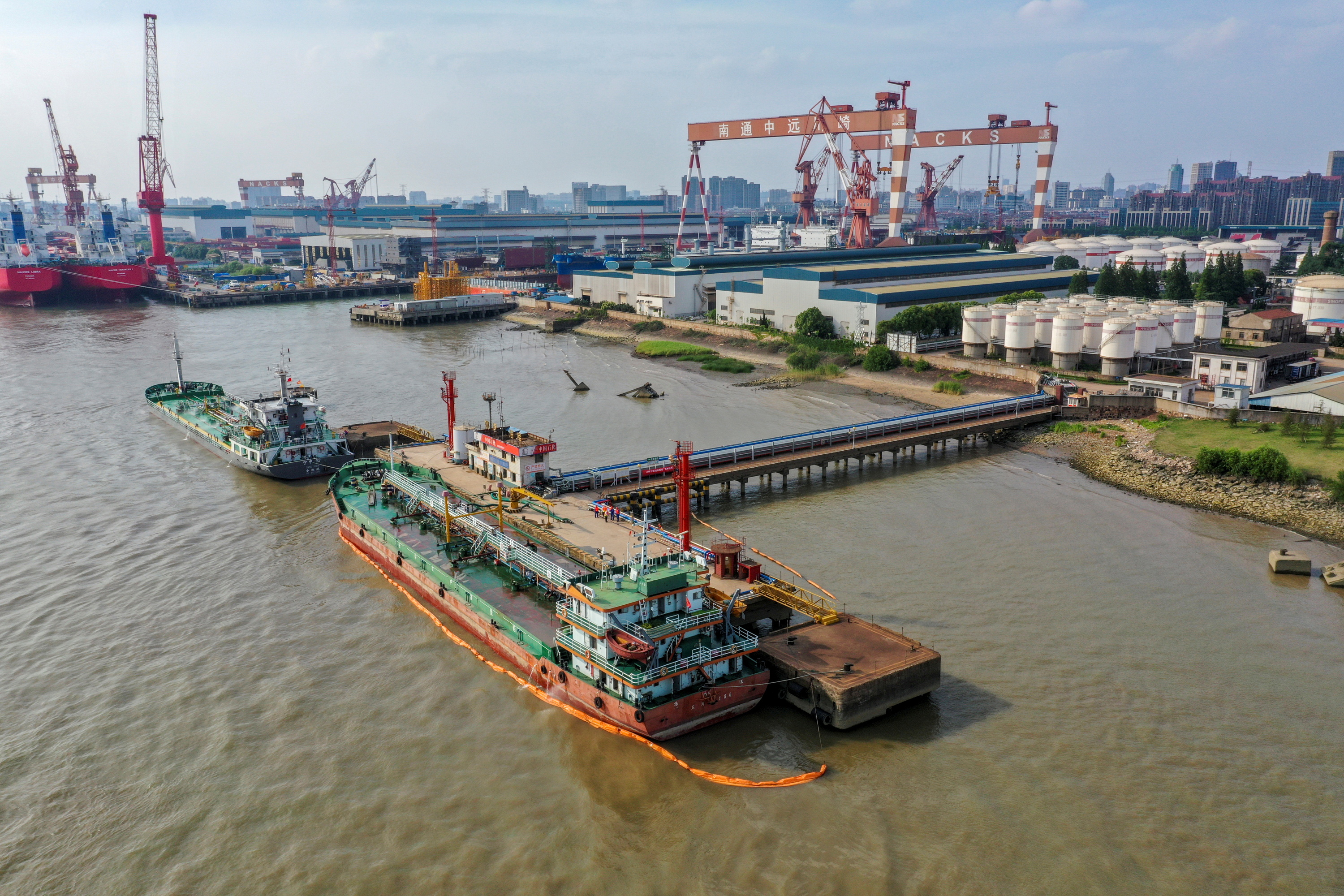 Oil tankers are seen at a terminal of Sinopec Yaogang oil depot in Nantong