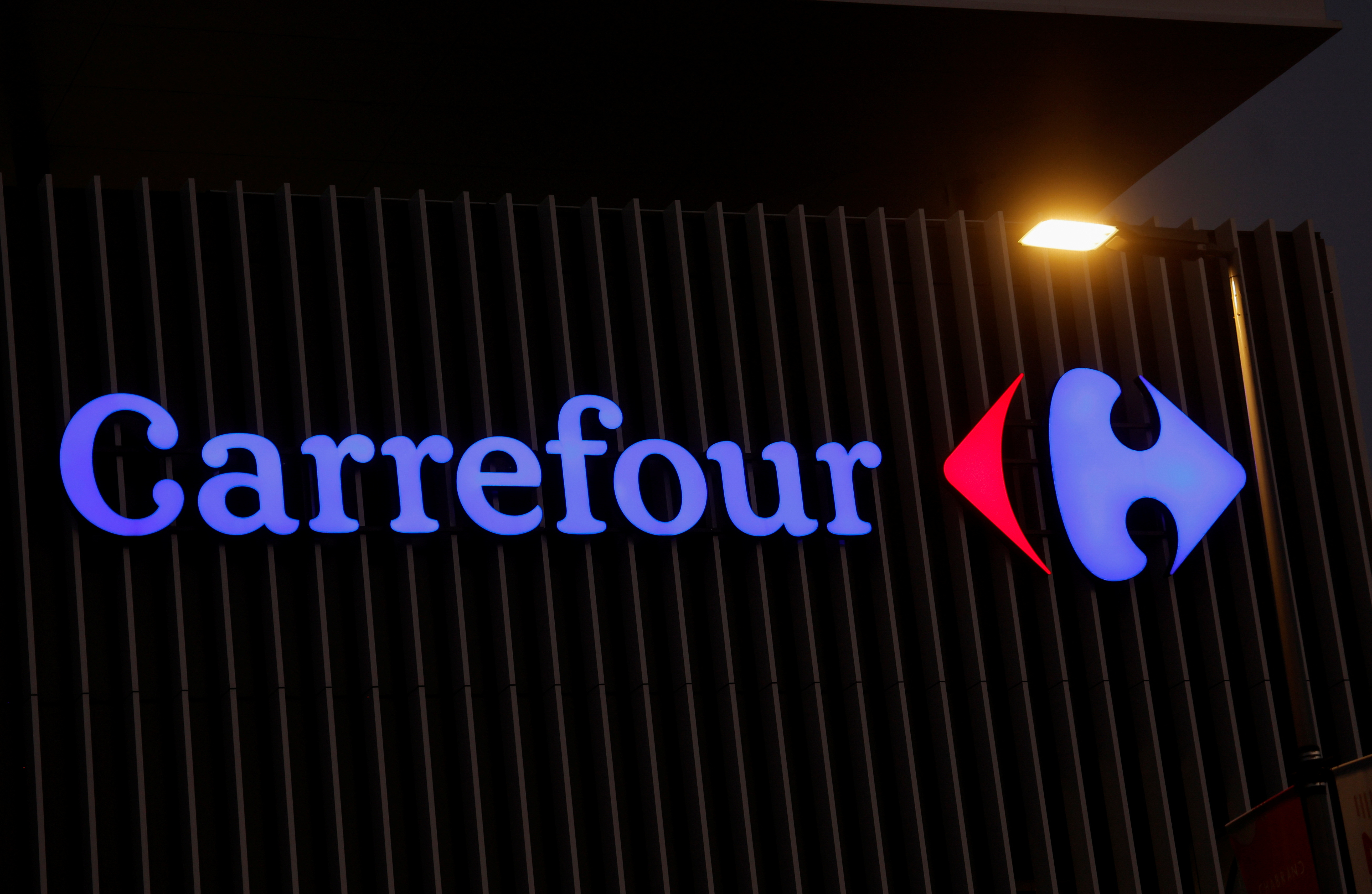 The logo of Carrefour is seen at a Carrefour Hypermarket store in Nice