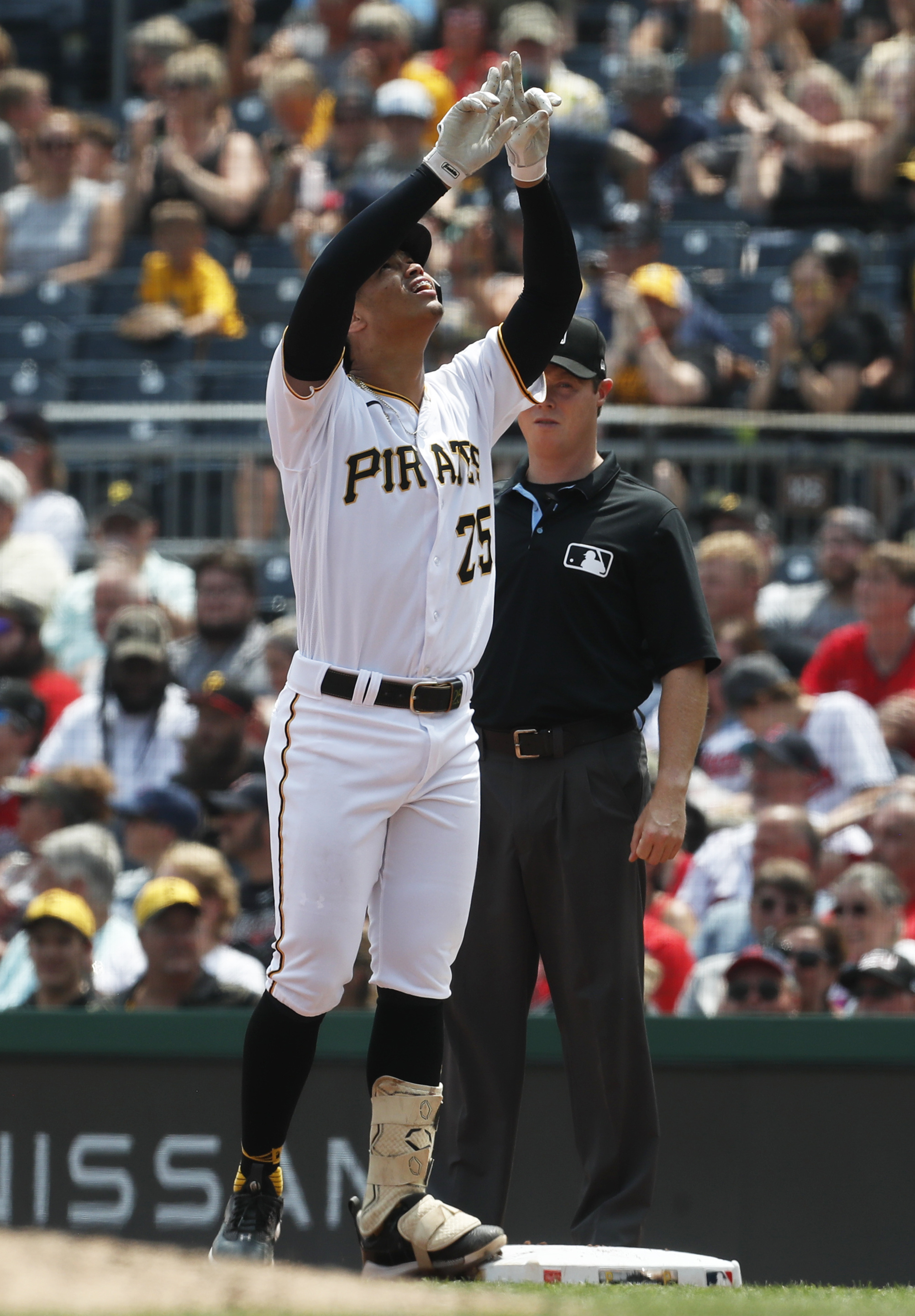 Pirates rally to topple Guardians, avoid sweep
