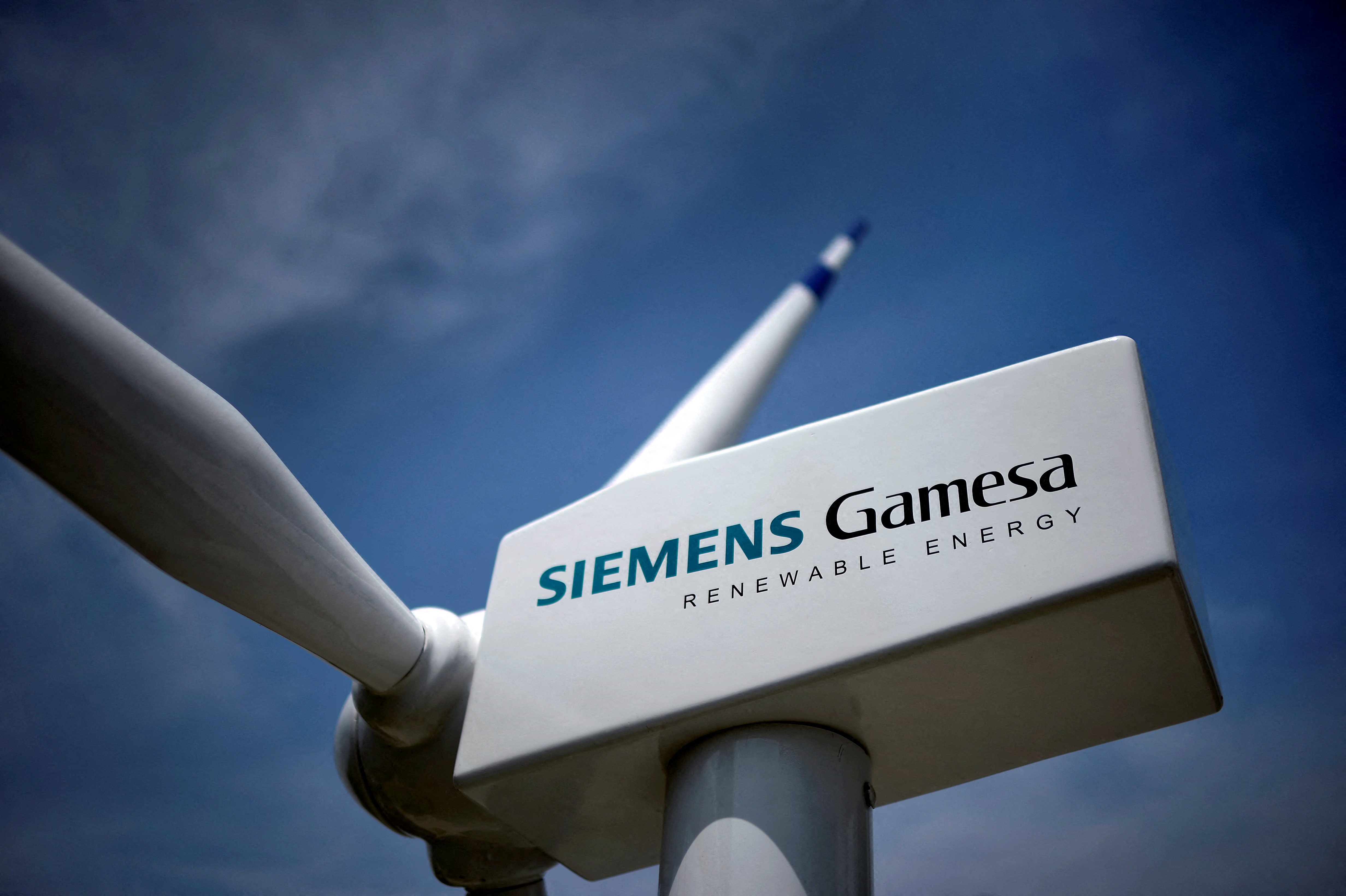 A model of a wind turbine with the Siemens Gamesa logo is displayed outside the annual general shareholders meeting in Zamudio