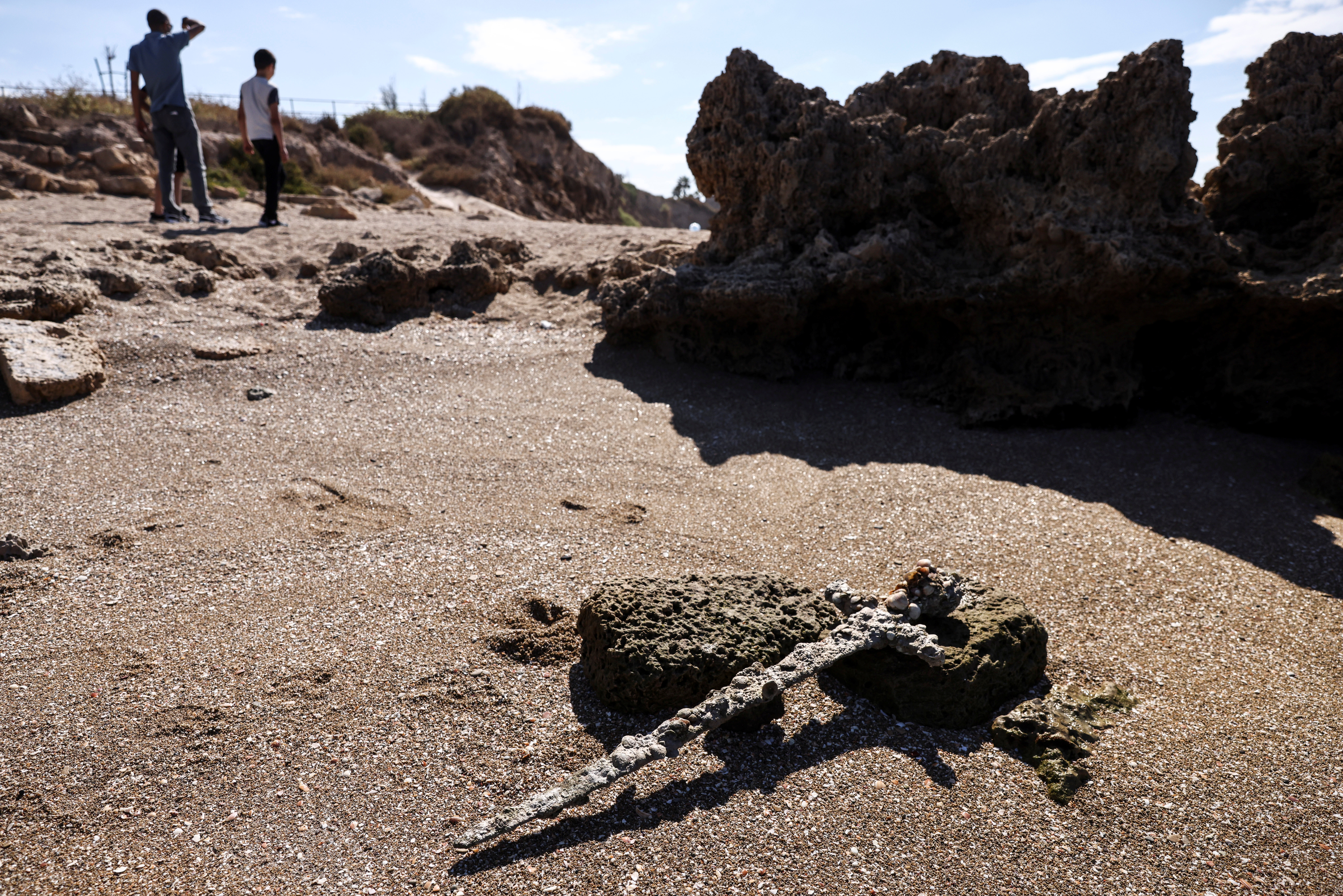 A sword believed to have belonged to a Crusader who sailed to the Holy Land almost a millennium ago was found in Caesarea