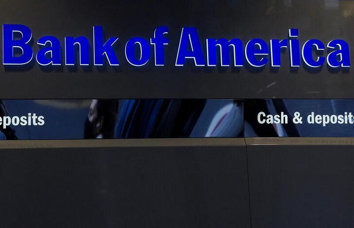 Person walks past a Bank of America sign in New York City