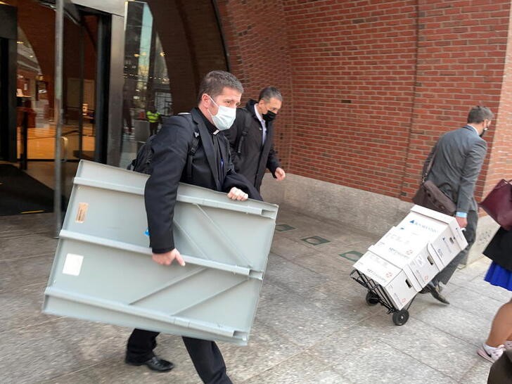 Rev. Emmanuel Lemelson exits federal courthouse in Boston