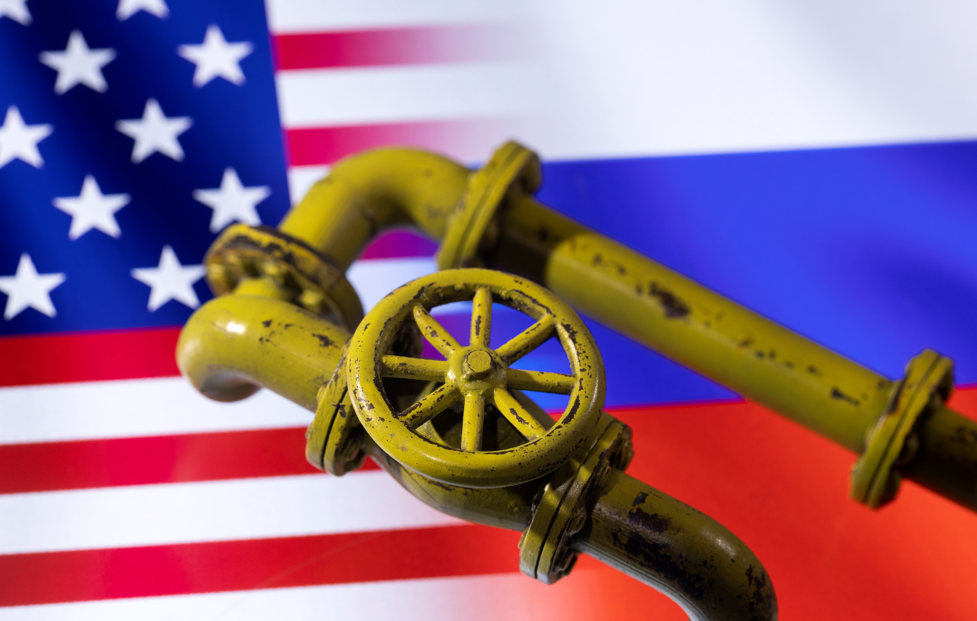 Illustration shows Natural Gas Pipes and U.S. and Russian flags