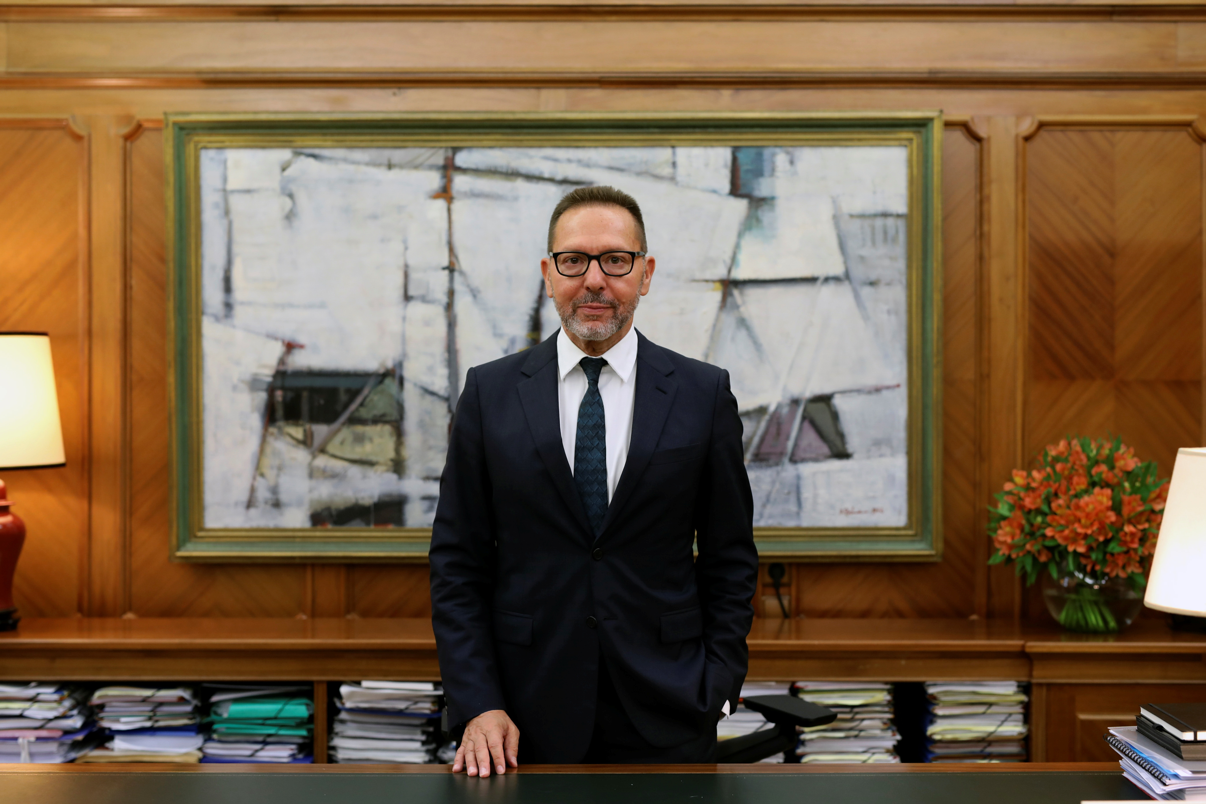 Central Bank Governor Yannis Stournaras poses for a photo in his office at the bank’s headquarters in Athens