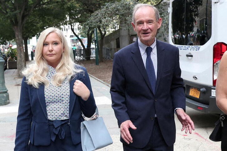 Lawyer David Boies arrives with his client Virginia Giuffre for hearing in the criminal case against Jeffrey Epstein, at Federal Court in New York, U.S., August 27, 2019. REUTERS/Shannon Stapleton/File Photo