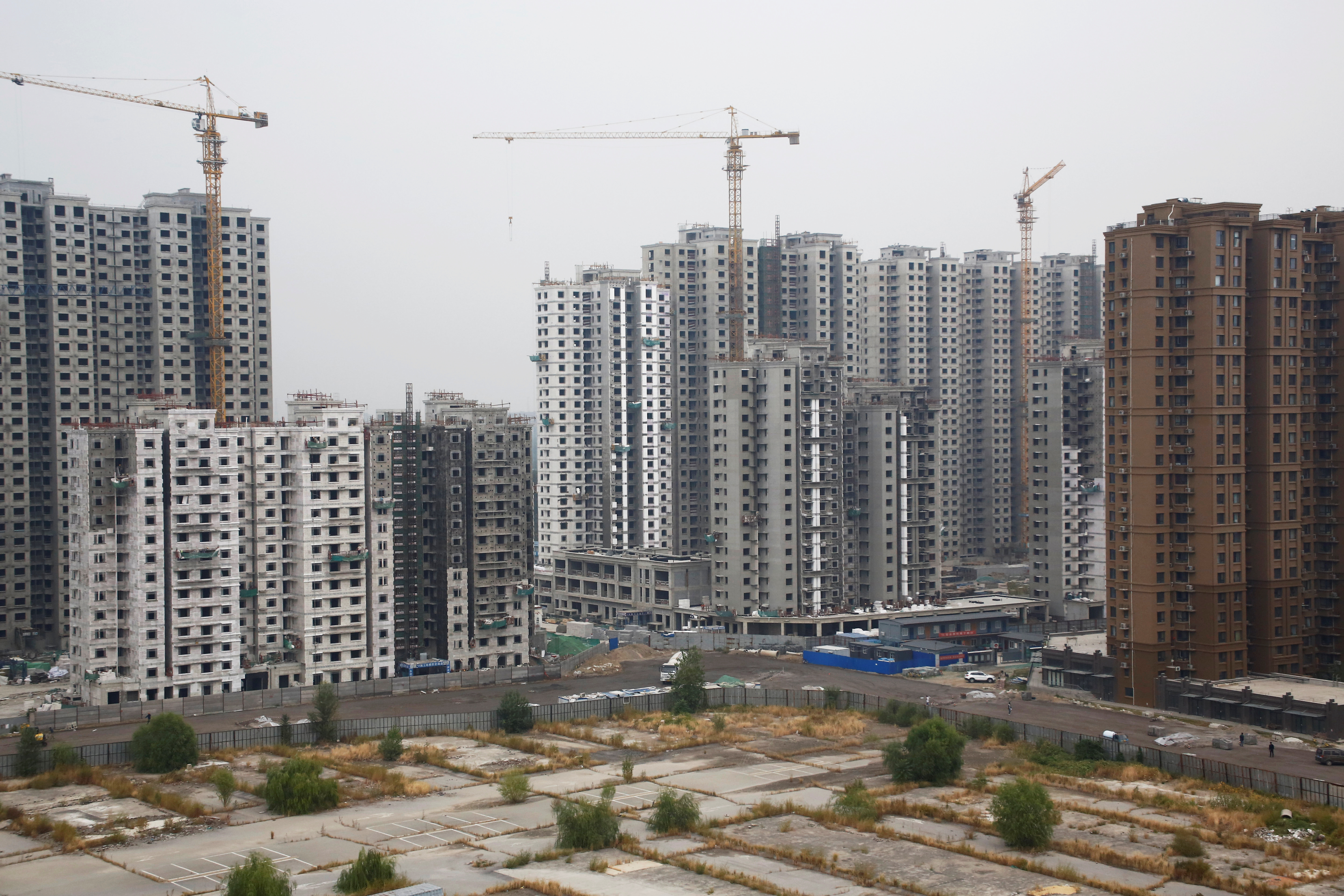 A general view shows a construction site of residential apartment blocks in Beijing