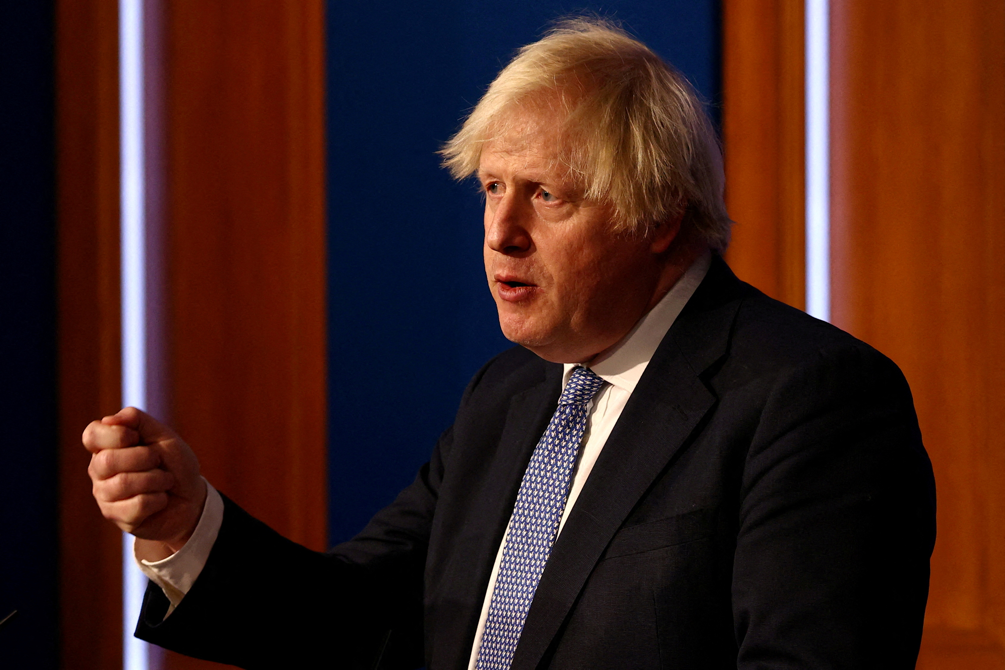 British Prime Minister Boris Johnson holds a news conference, in London