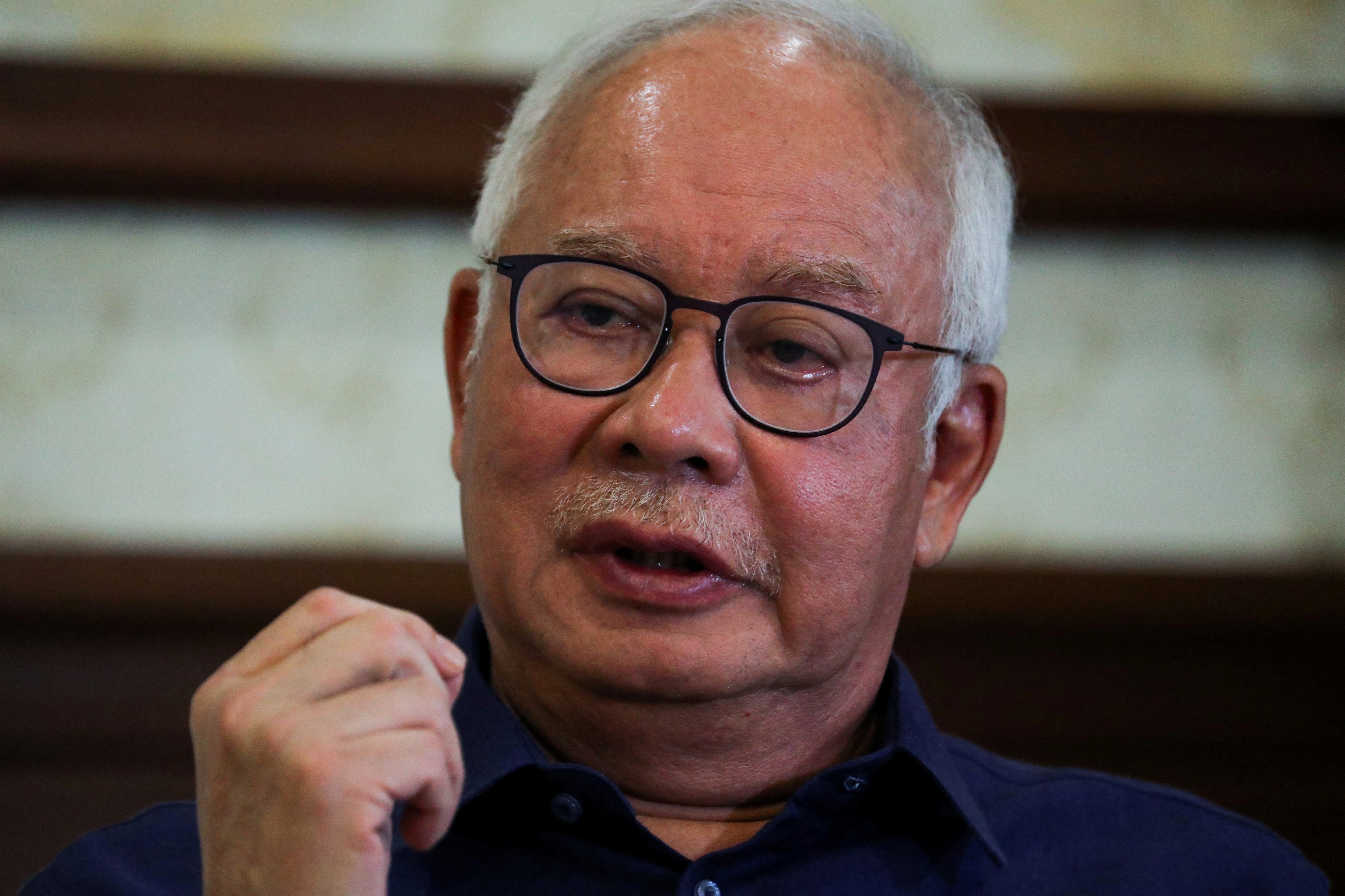Malaysia's former Prime Minister Najib Razak speaks during an interview with Reuters in Kuala Lumpur