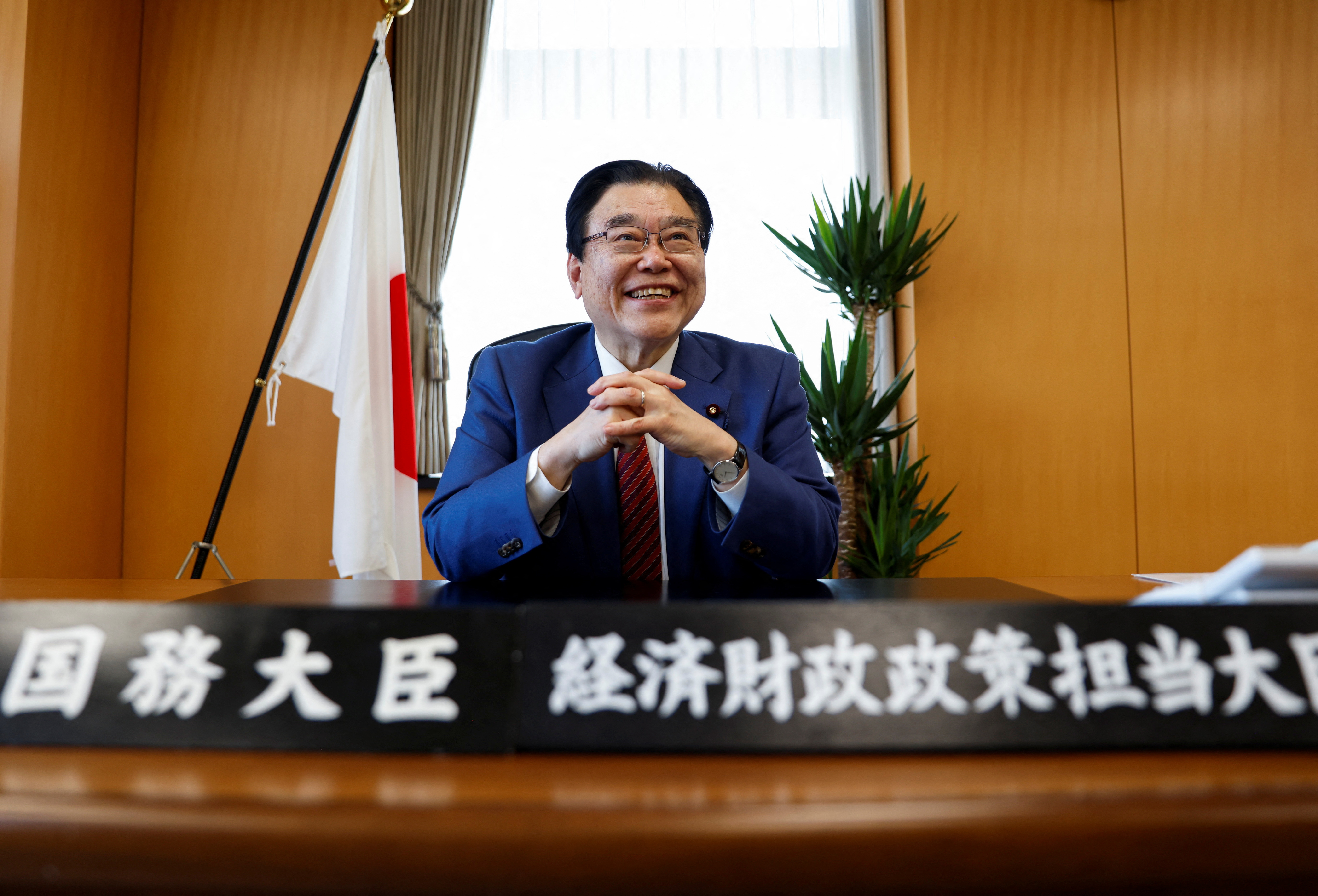 Japan's Minister for Economic Revitalisation Shigeyuki Goto speaks during an interview with Reuters in Tokyo
