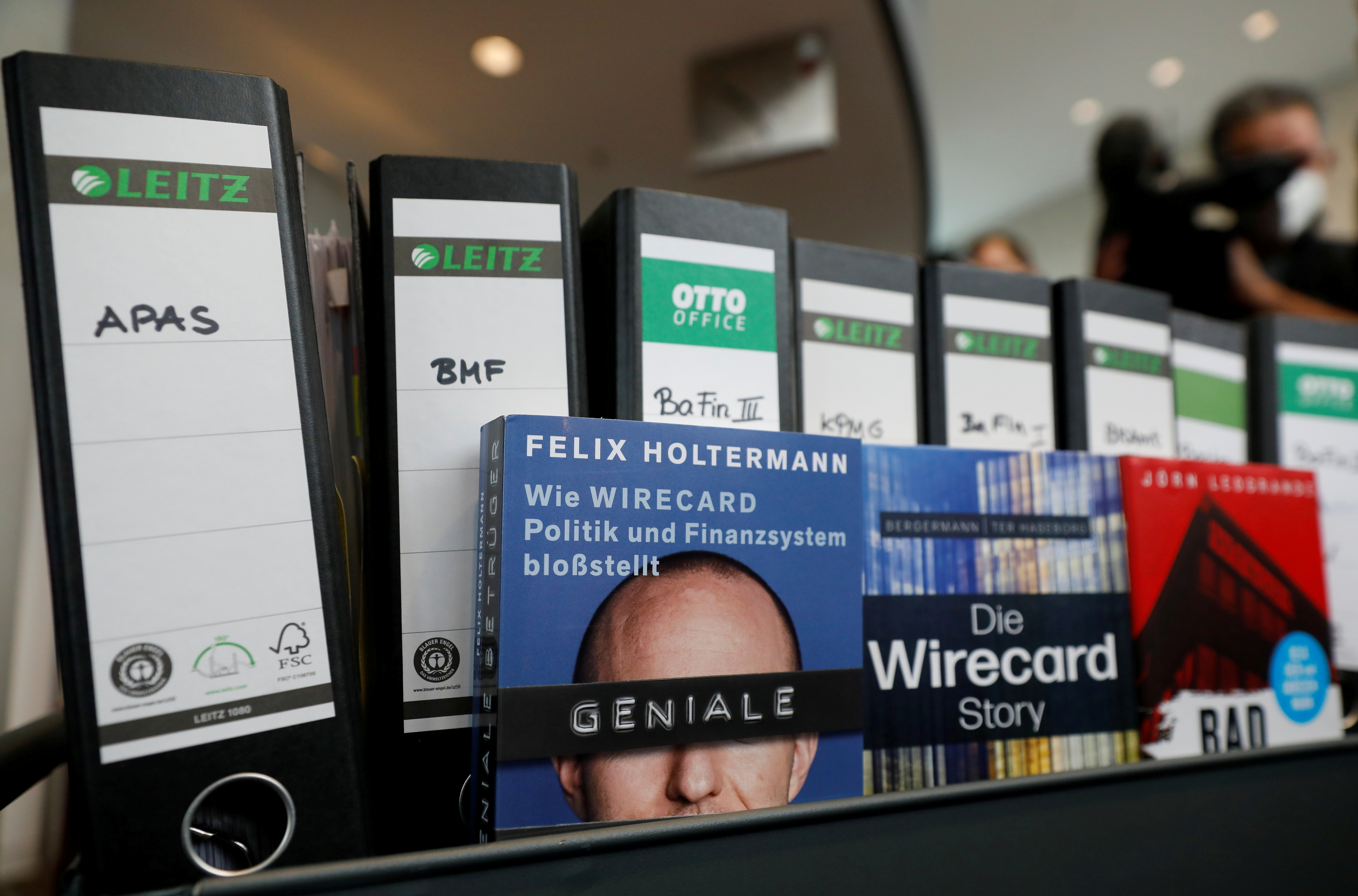 Wirecard acts and books about the company are pictured, in Berlin
