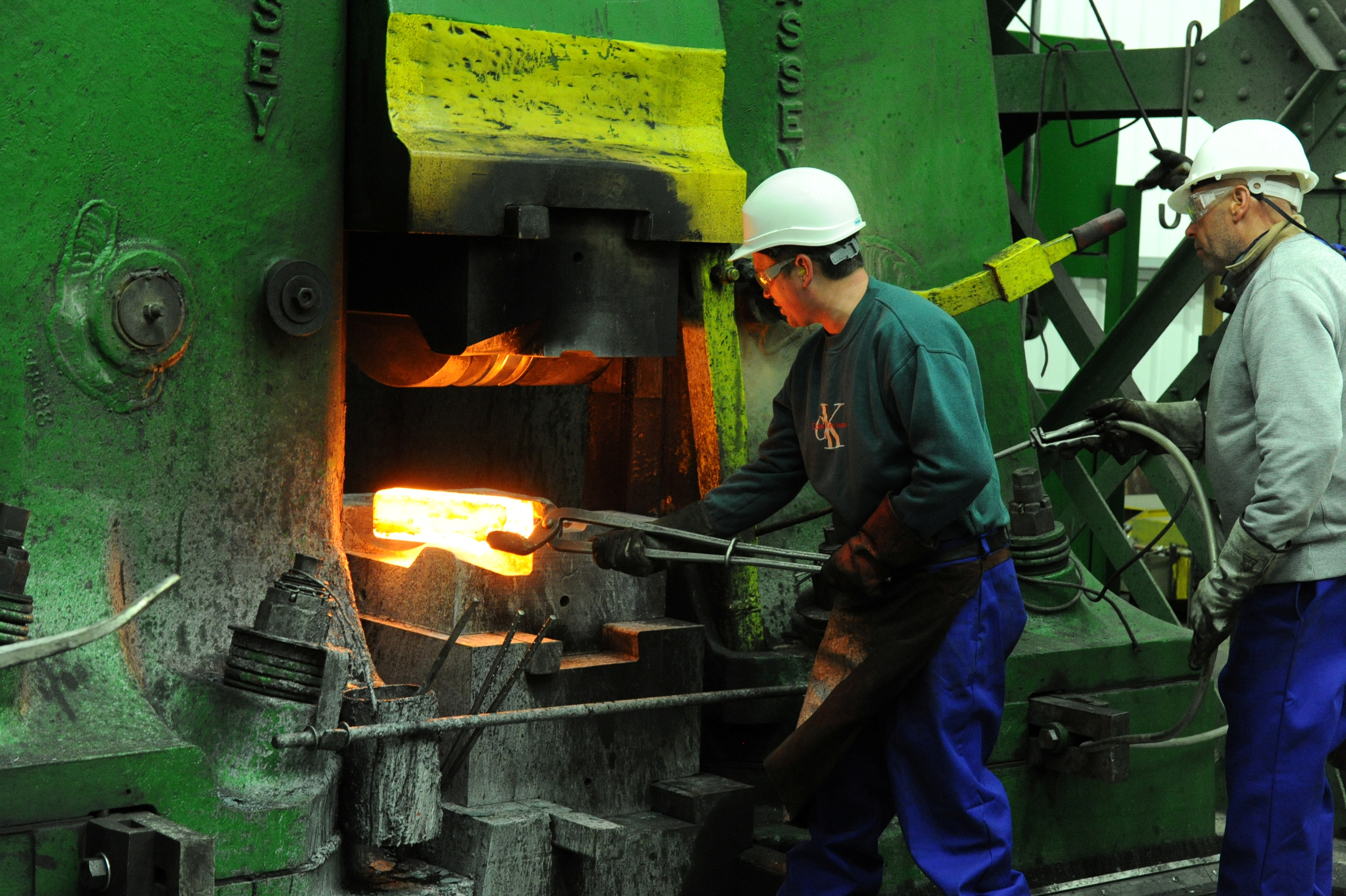 Workers forge at manufacturers Kimber Mills in Cradley Heath