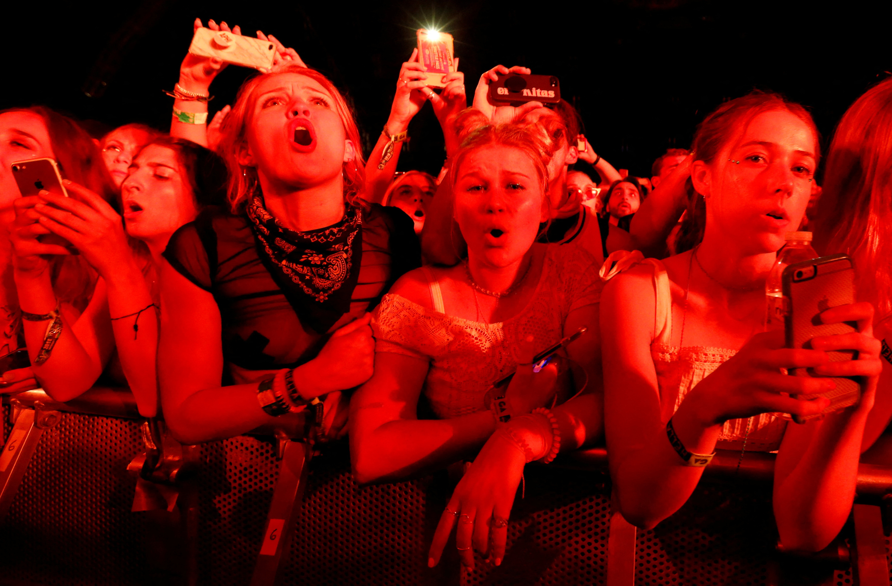 Concertgoers watch a performance by Post Malone at the Coachella Valley Music and Arts Festival in Indio