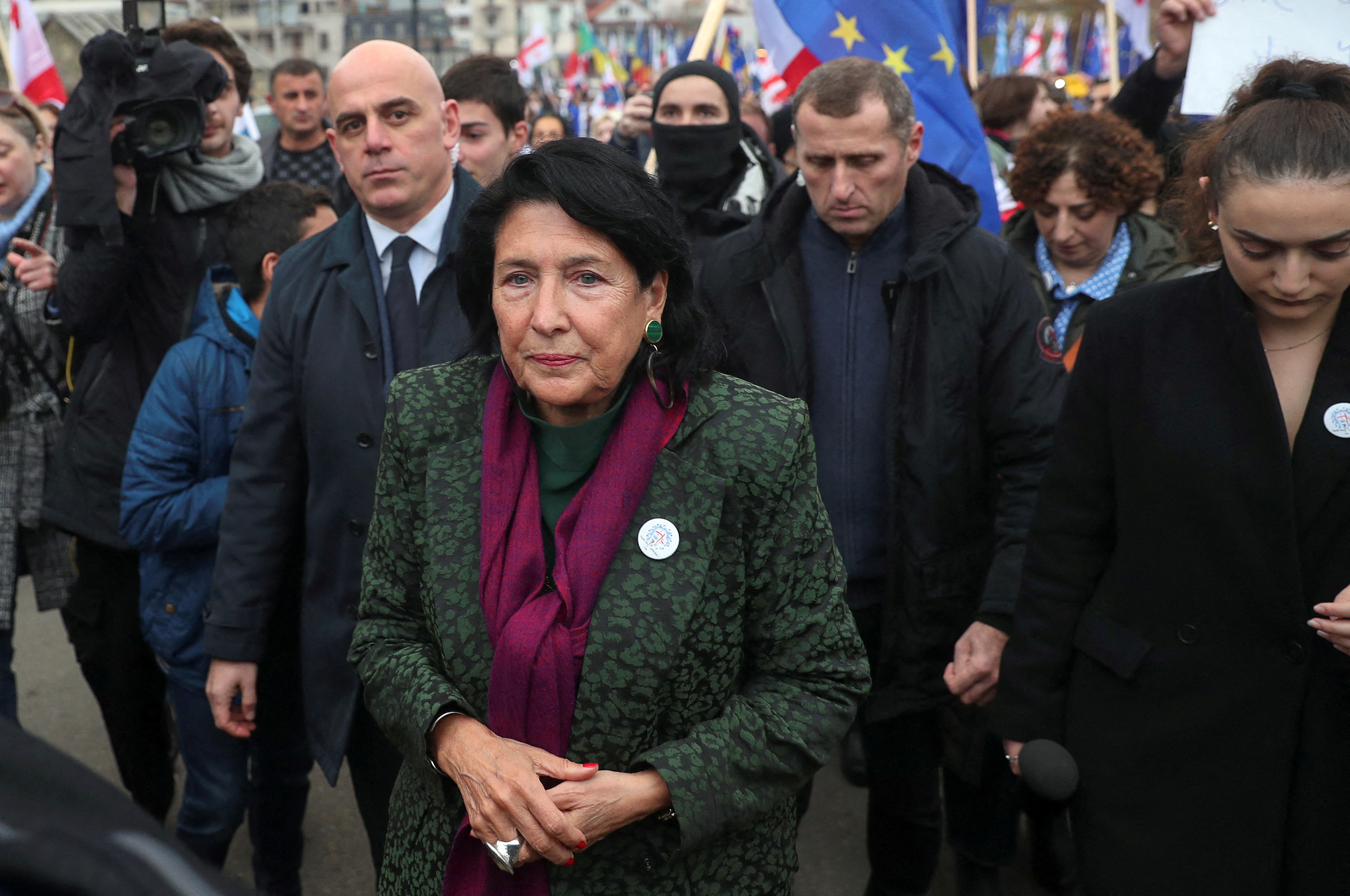 Participants, including Georgia's President Salome Zourabichvili, walk during a procession in support of the country's membership in the European Union in Tbilisi ,