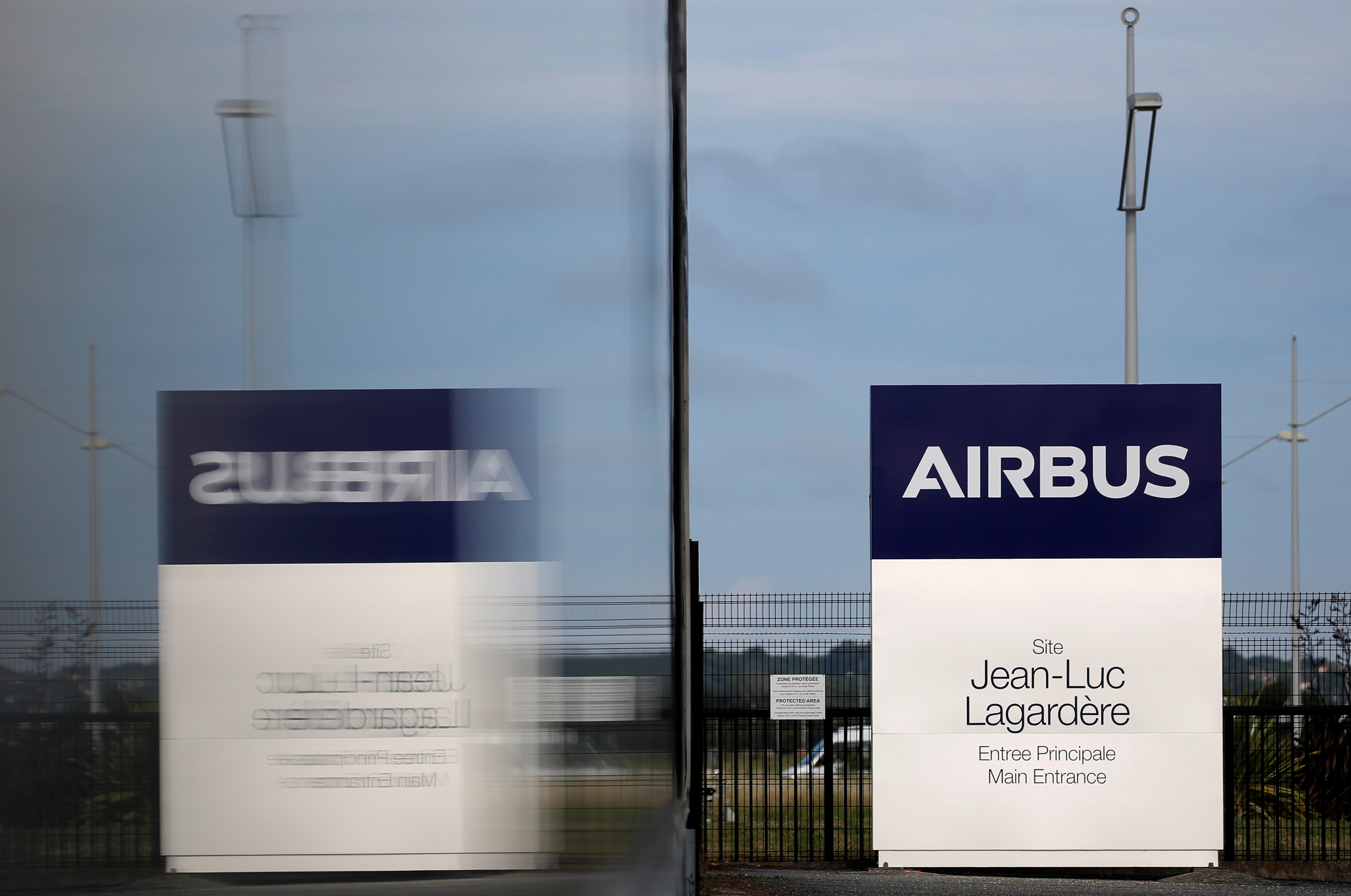 A logo of Airbus is seen at the entrance of the Jean-Luc Lagardere A380 production plant at Airbus headquarters in Blagnac, near Toulouse, France June 18, 2020. Picture taken June 18, 2020. REUTERS/Stephane Mahe