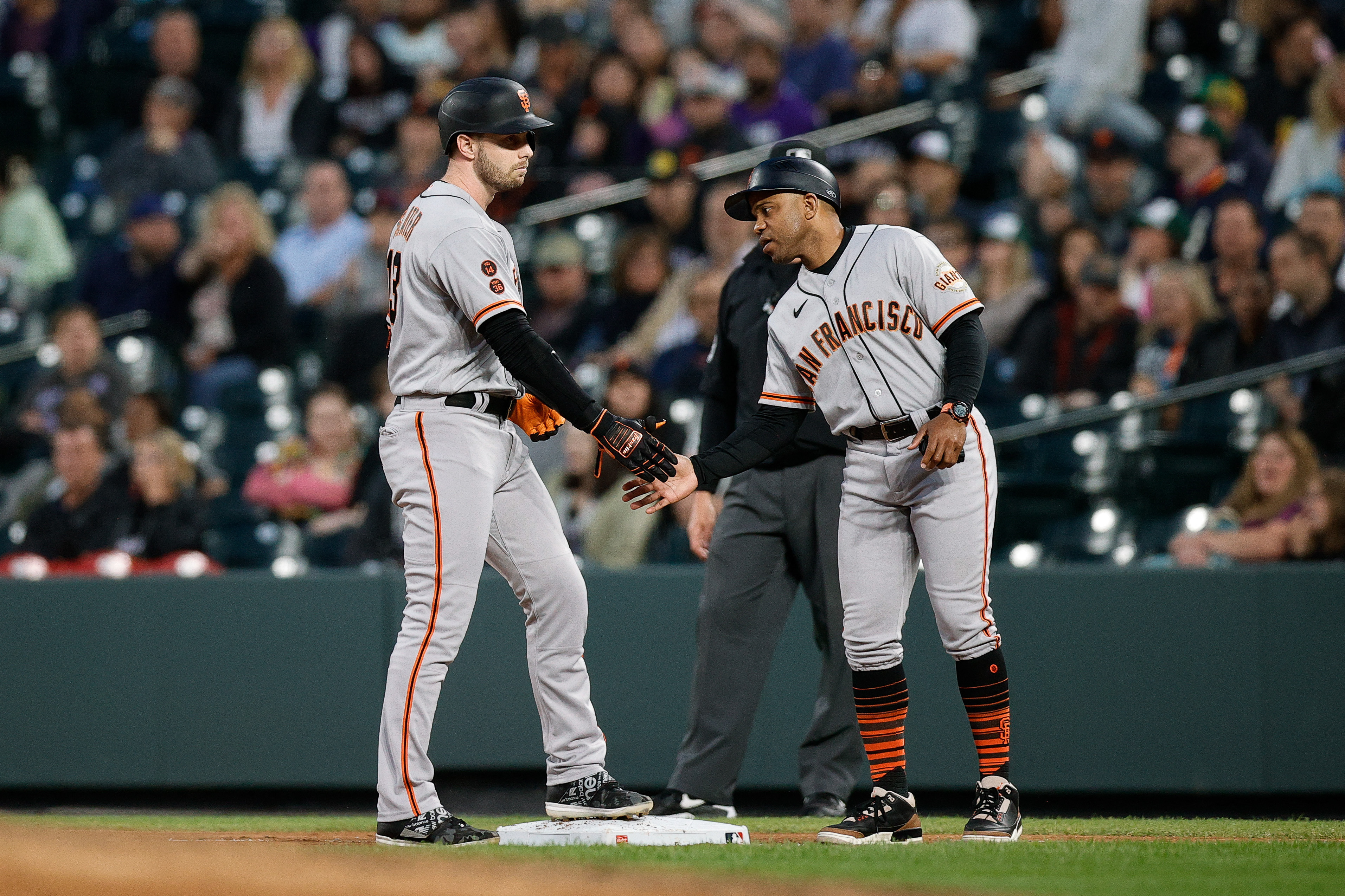 Giants overcome four-run deficit to beat Rockies