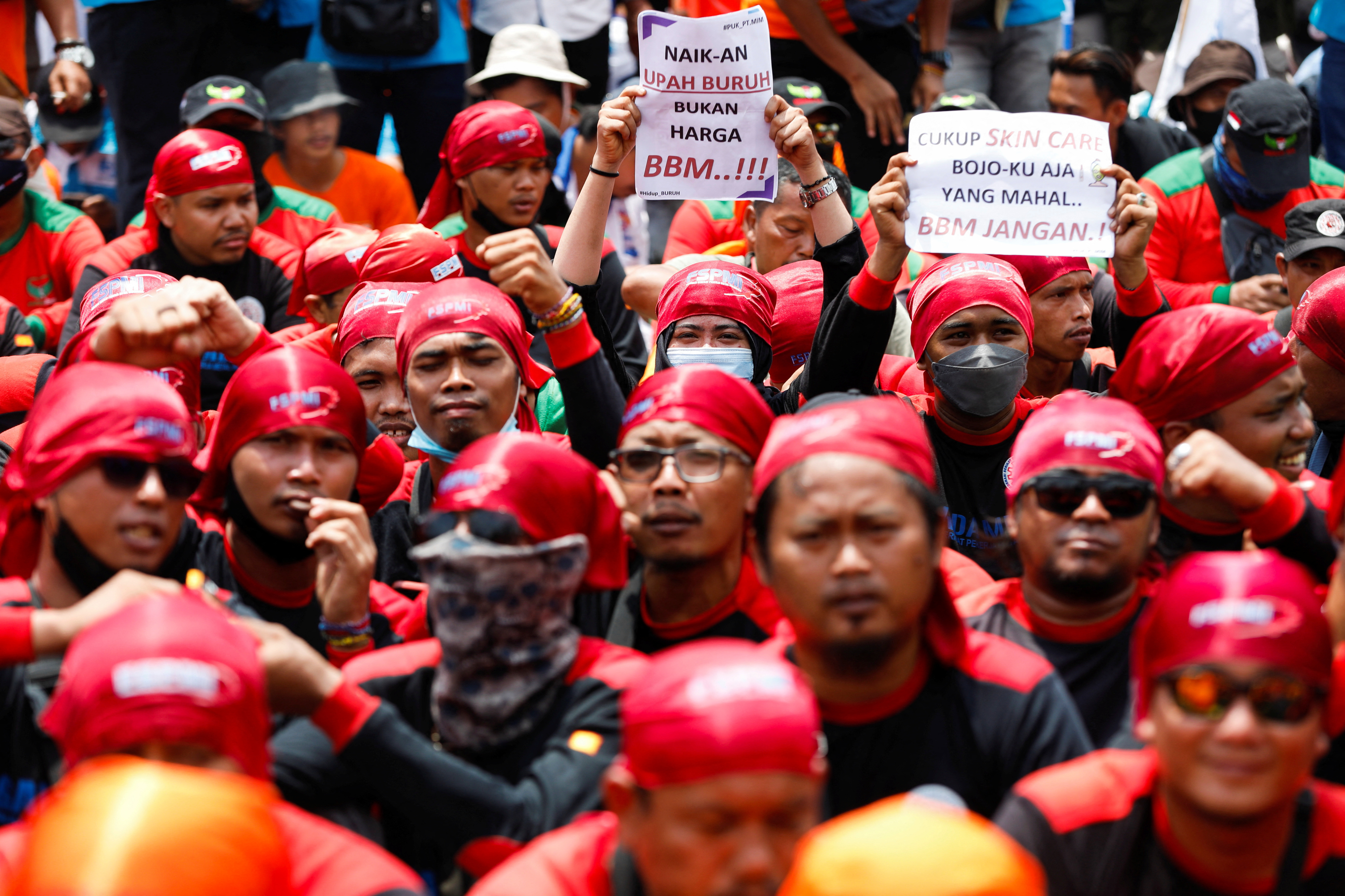 Members of Indonesian labour organizations protest against the government outside the Indonesian Parliament following raised subsidised fuel prices in Jakarta,