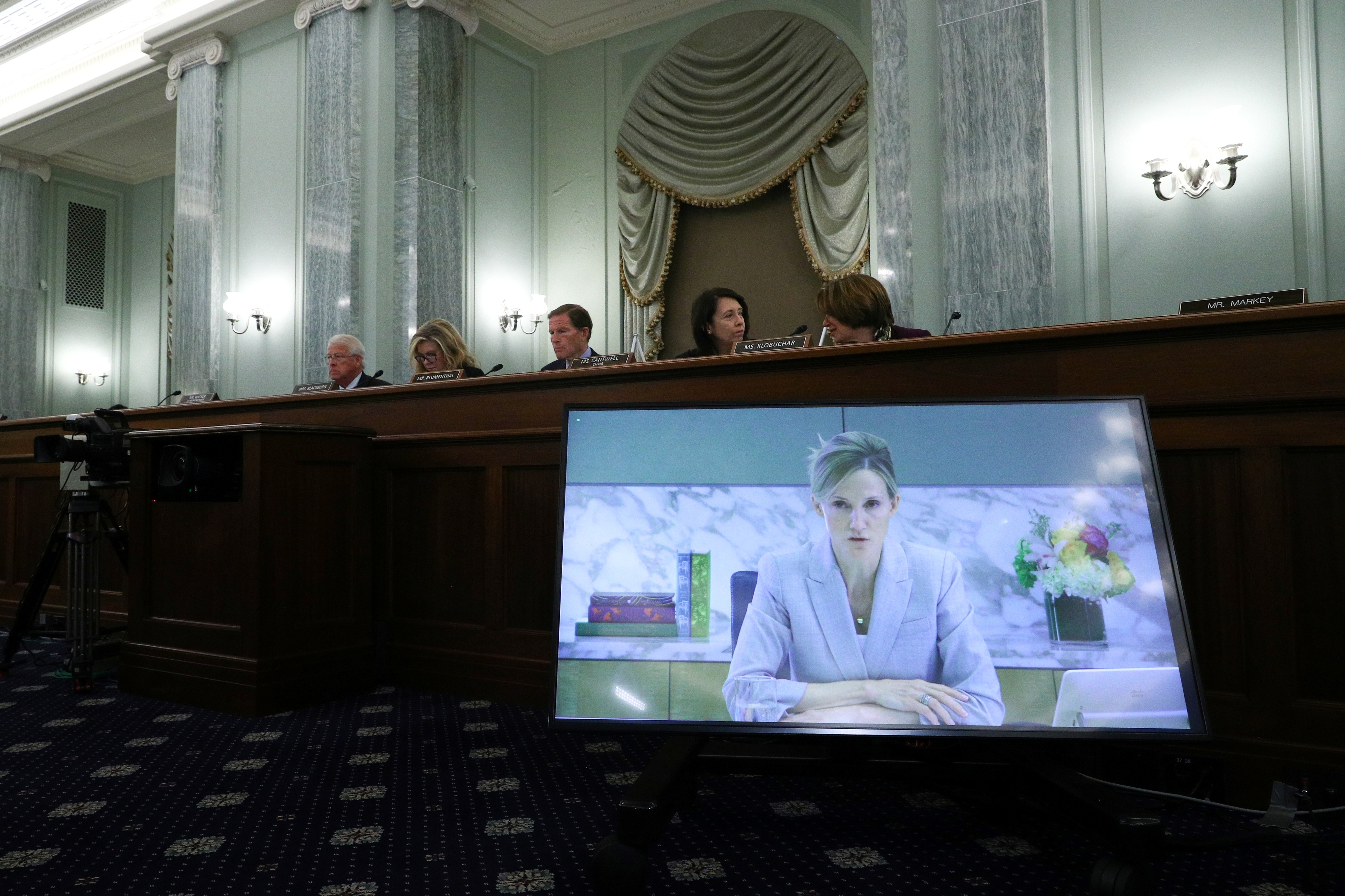 Antigone Davis, Director of the Global Head of Safety at Facebook, is seen on a screen as she testifies before the Senate Commerce, Science, and Transportation - Subcommittee on Consumer Protection, Product Safety, and Data Security, on Capitol Hill in Washington, DC, U.S., September 30, 2021.  Tom Brenner/Pool via REUTERS