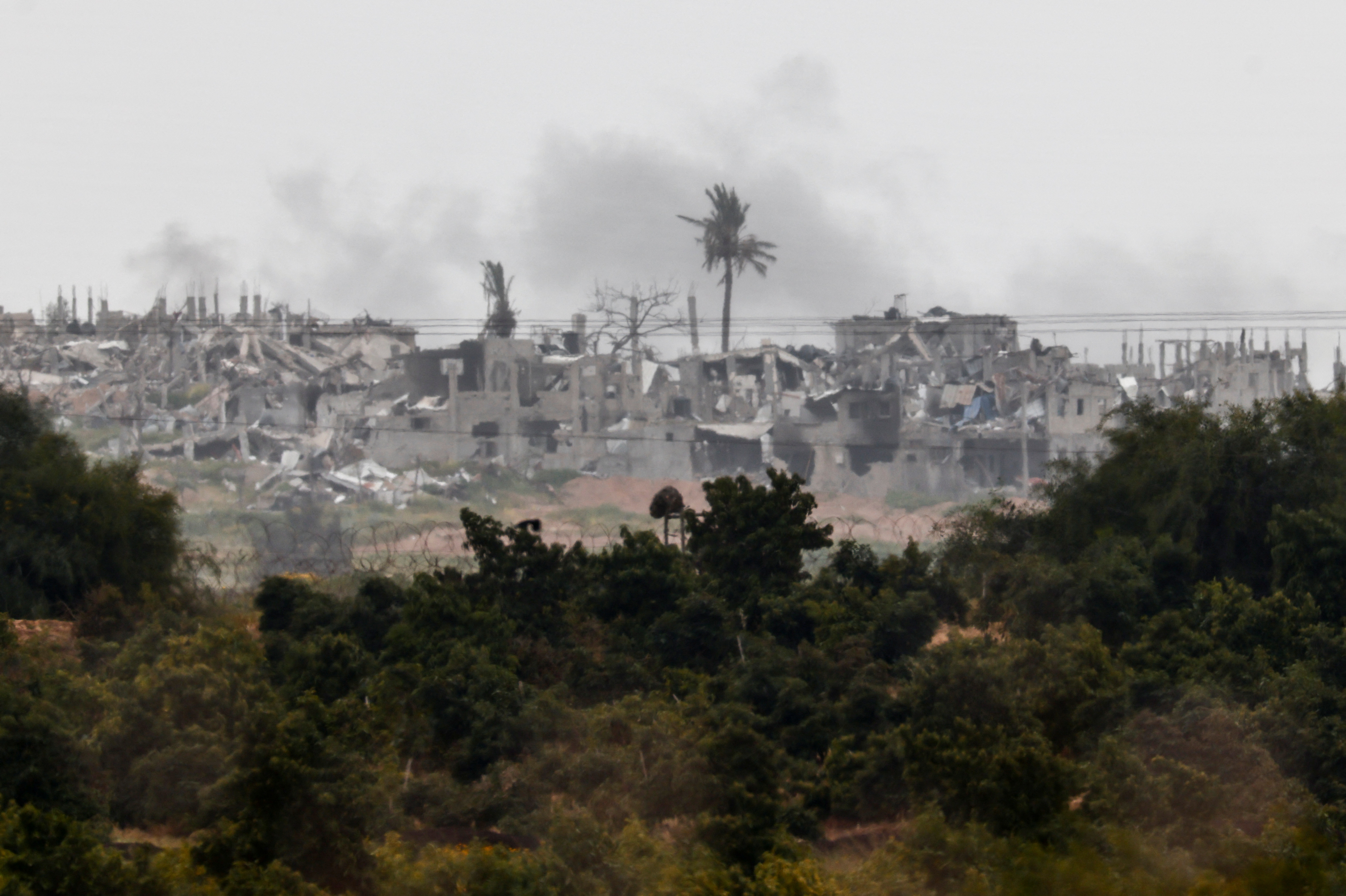 Smoke rises in the Gaza Strip following an Israeli airstrike, as seen from Israel's border with Gaza in southern Israel