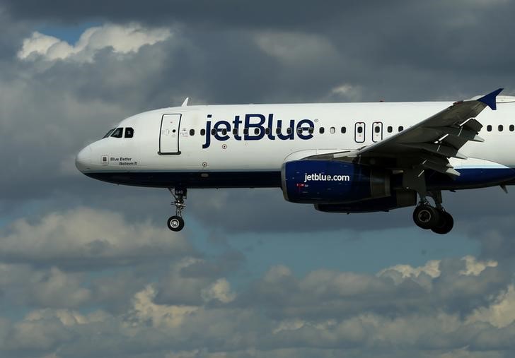 A JetBlue aircraft comes in to land at Long Beach Airport in Long Beach