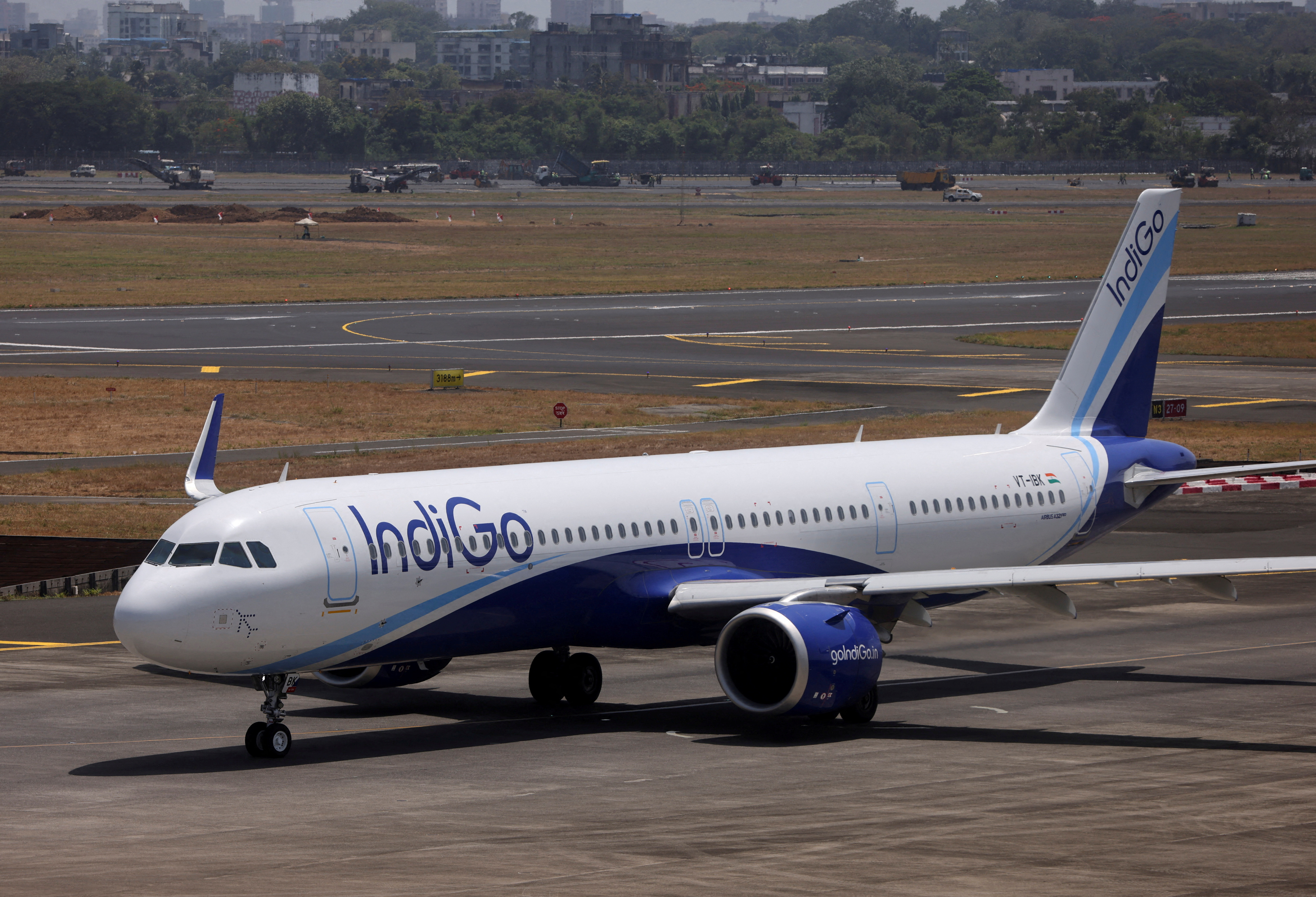 An IndiGo airlines passenger aircraft taxis on the tarmac at Chhatrapati Shivaji International airport in Mumbai