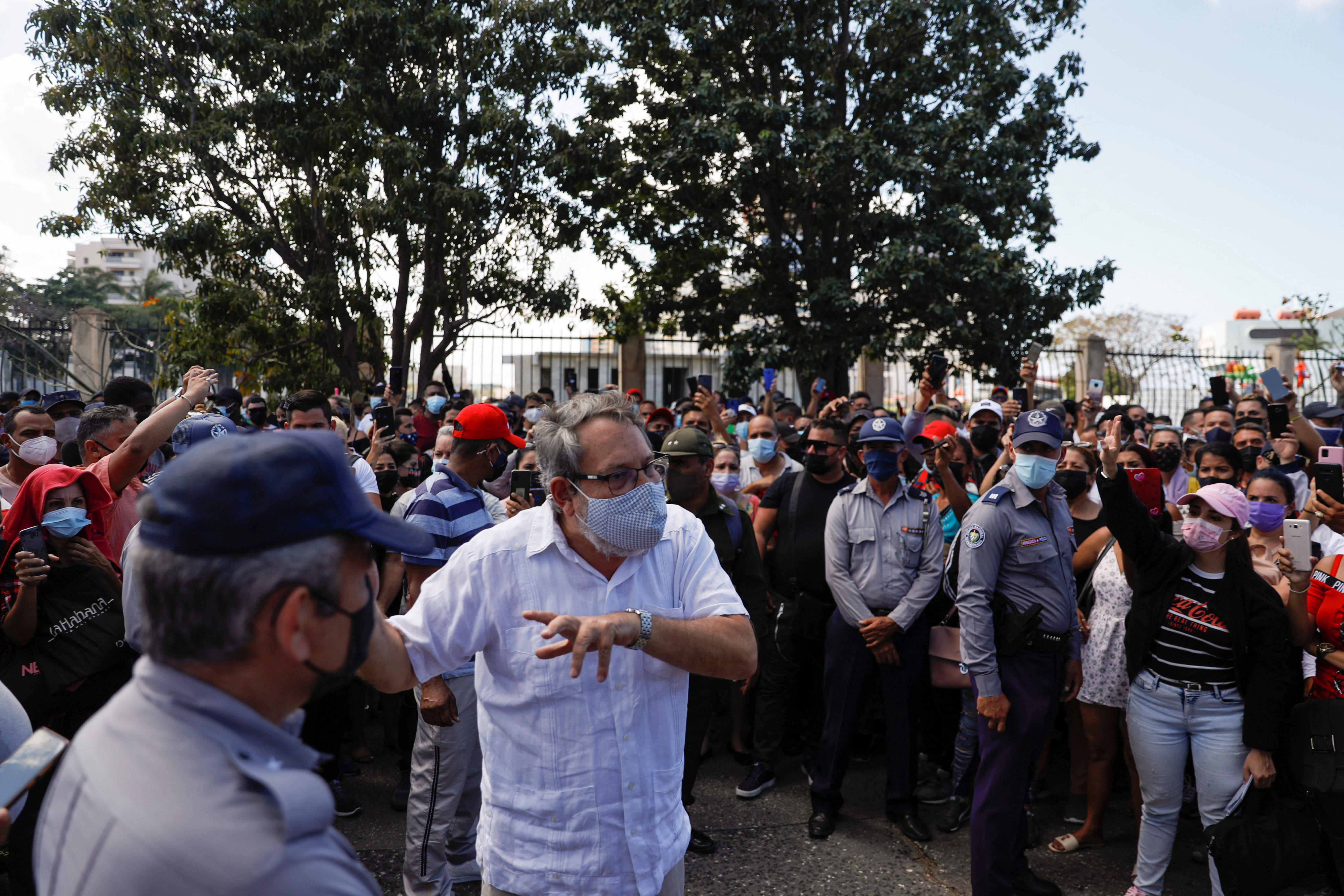 People crowd near Costa Rica embassy after the country imposed visa requirements for Cubans in Havana