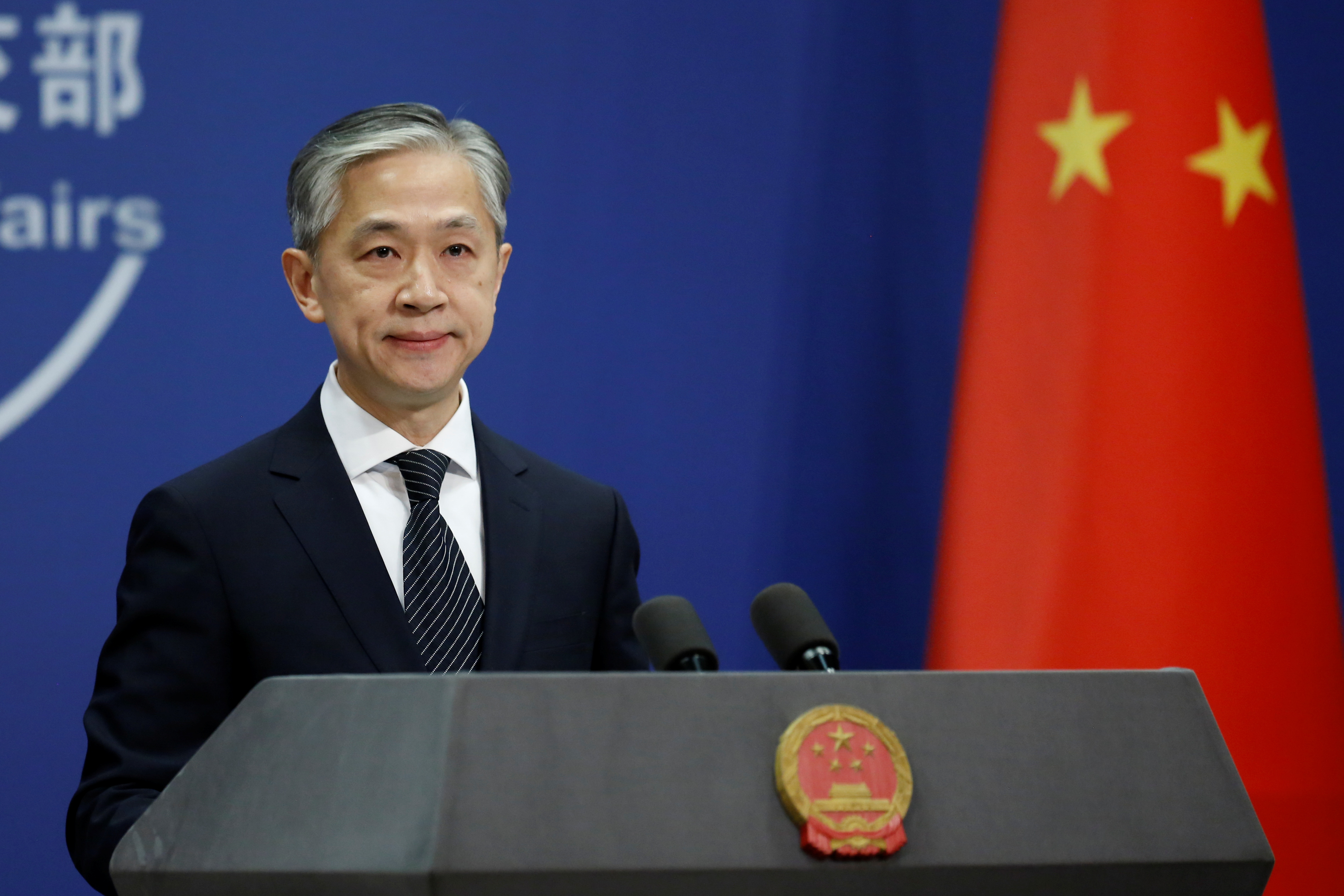 Chinese Foreign Ministry spokesman Wang Wenbin attends a news conference in Beijing, China November 9, 2020. REUTERS/Tingshu Wang/File Photo