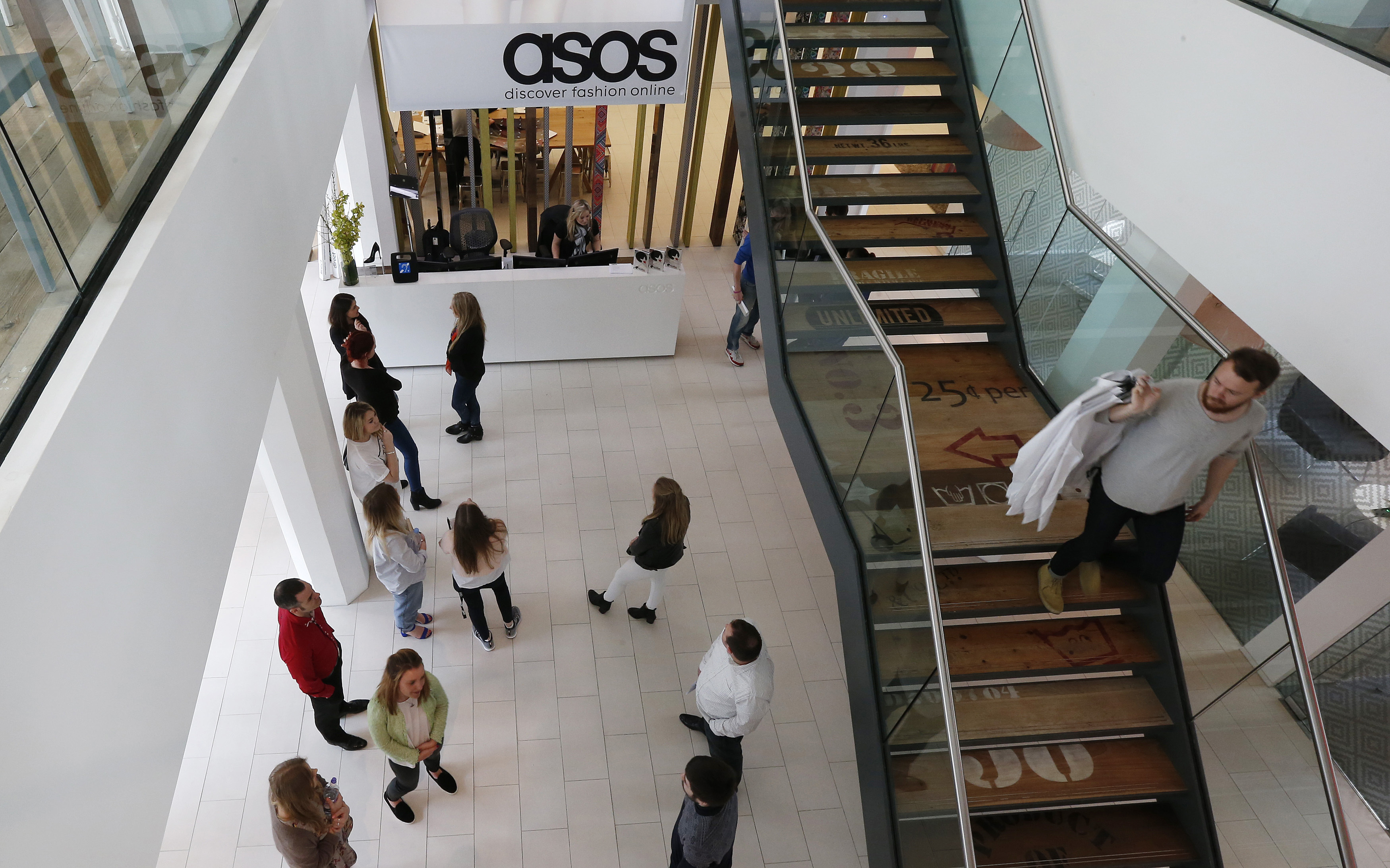 ASOS shares slump as sales plummet | Reuters