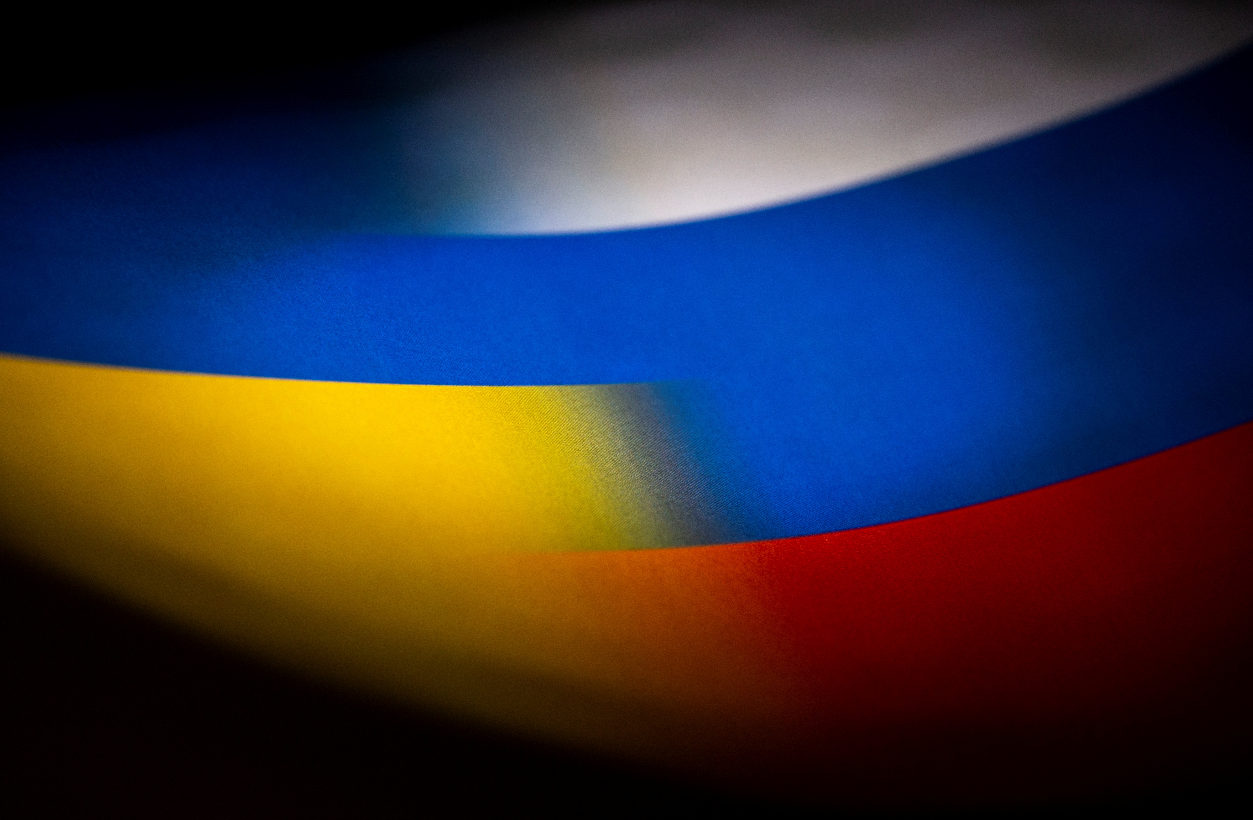 Illustration shows Russia's and Ukraine's flags