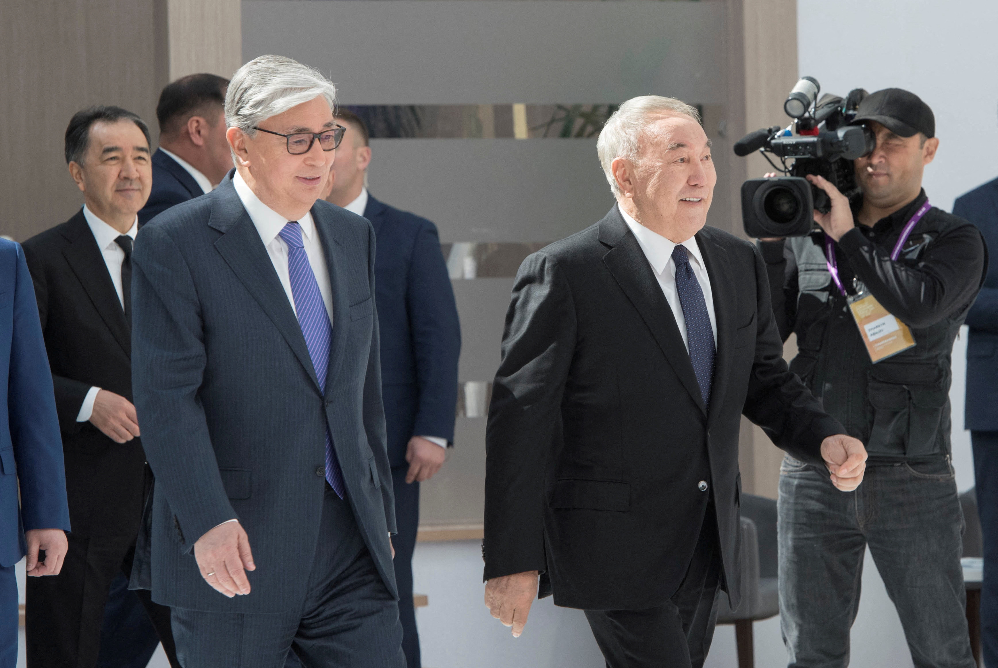 Kassym-Jomart Tokayev and Nursultan Nazarbayev attend the Astana Economic Forum in Nur-Sultan