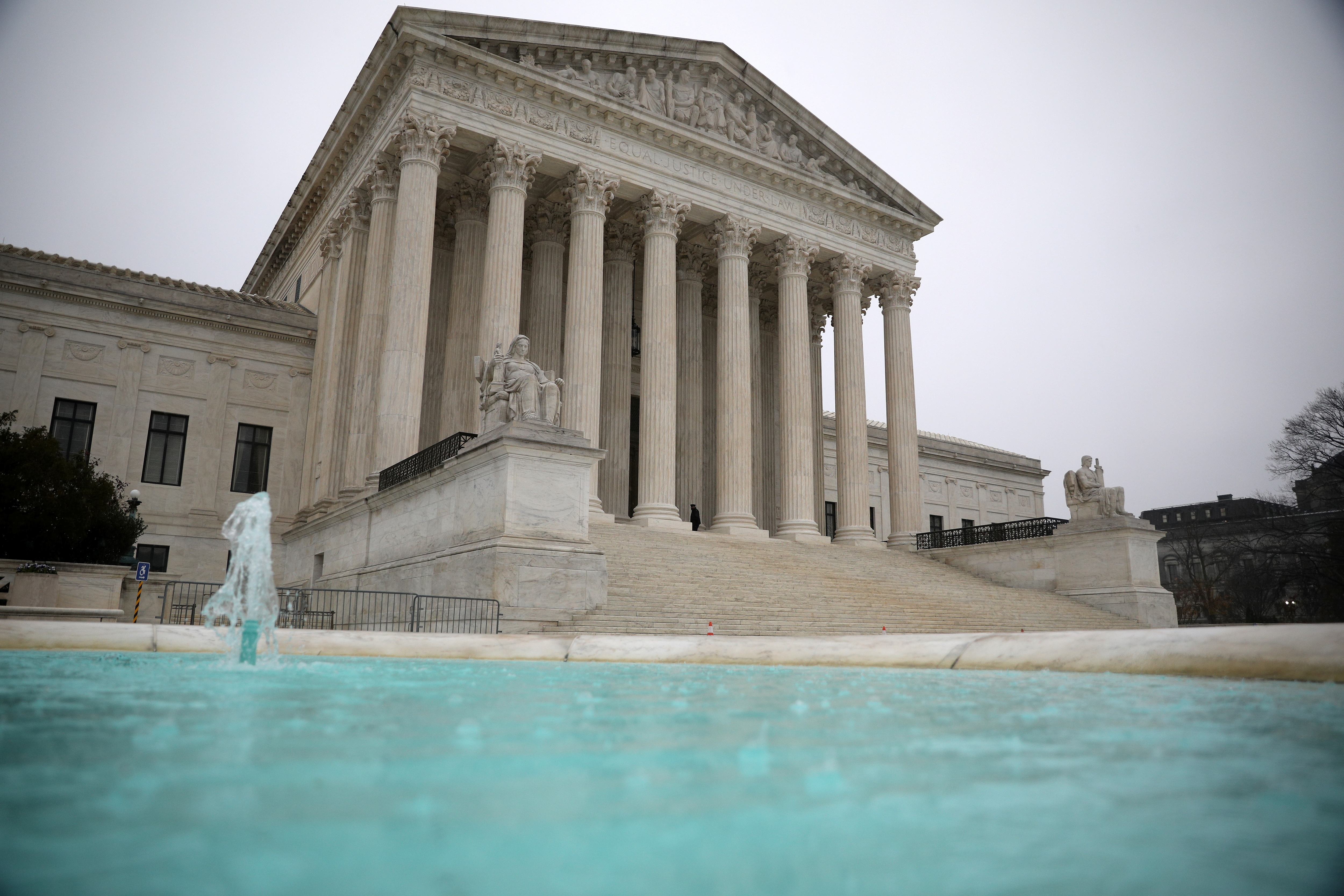 The United States Supreme Court during a rain storm on Capitol Hill in Washington