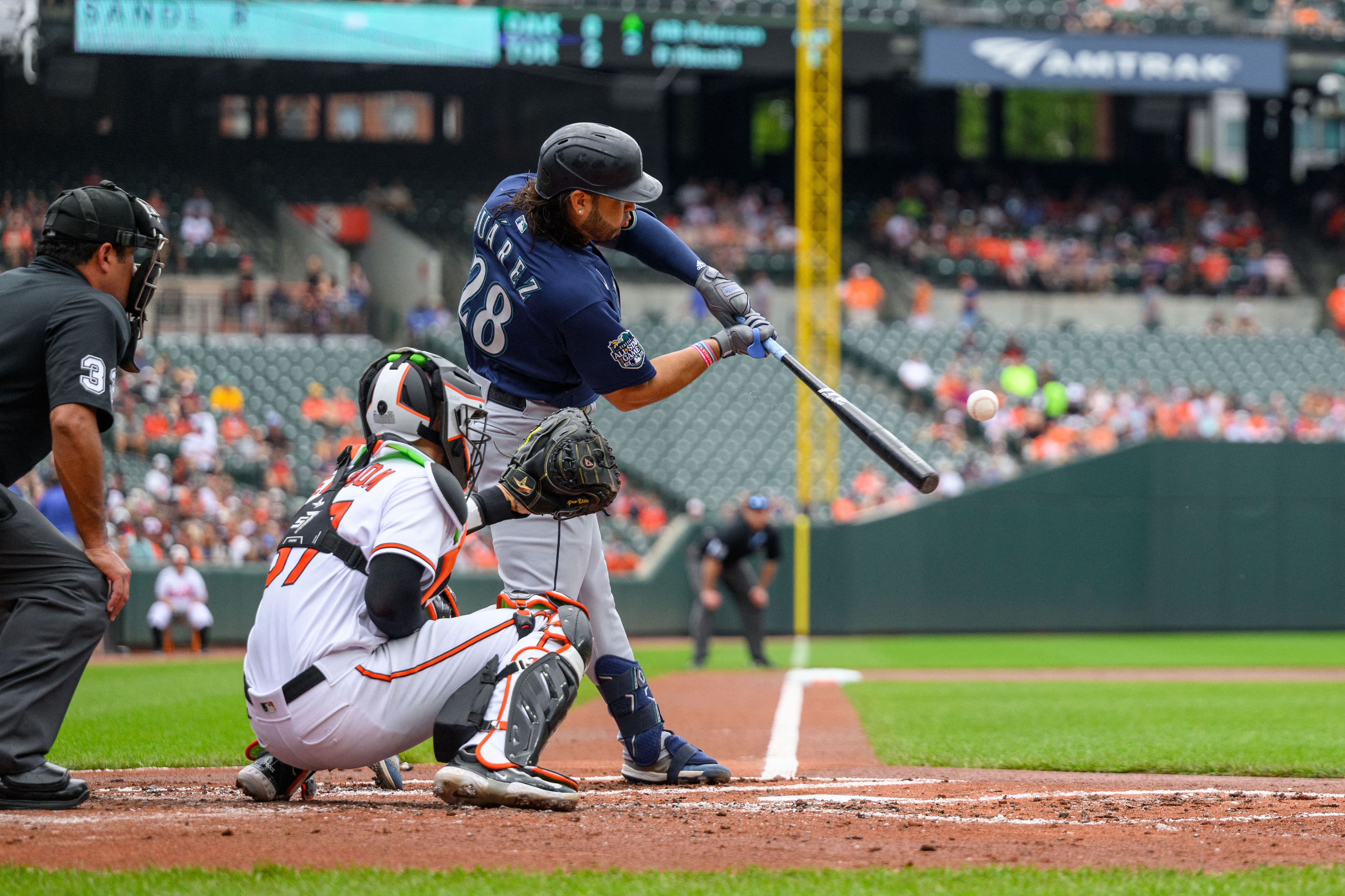 BALTIMORE, MD - MAY 31: Baltimore Orioles right fielder Anthony Santander  (25) makes a catch during the Seattle Mariners game versus the Baltimore  Orioles on May 31, 2022 at Orioles Park at