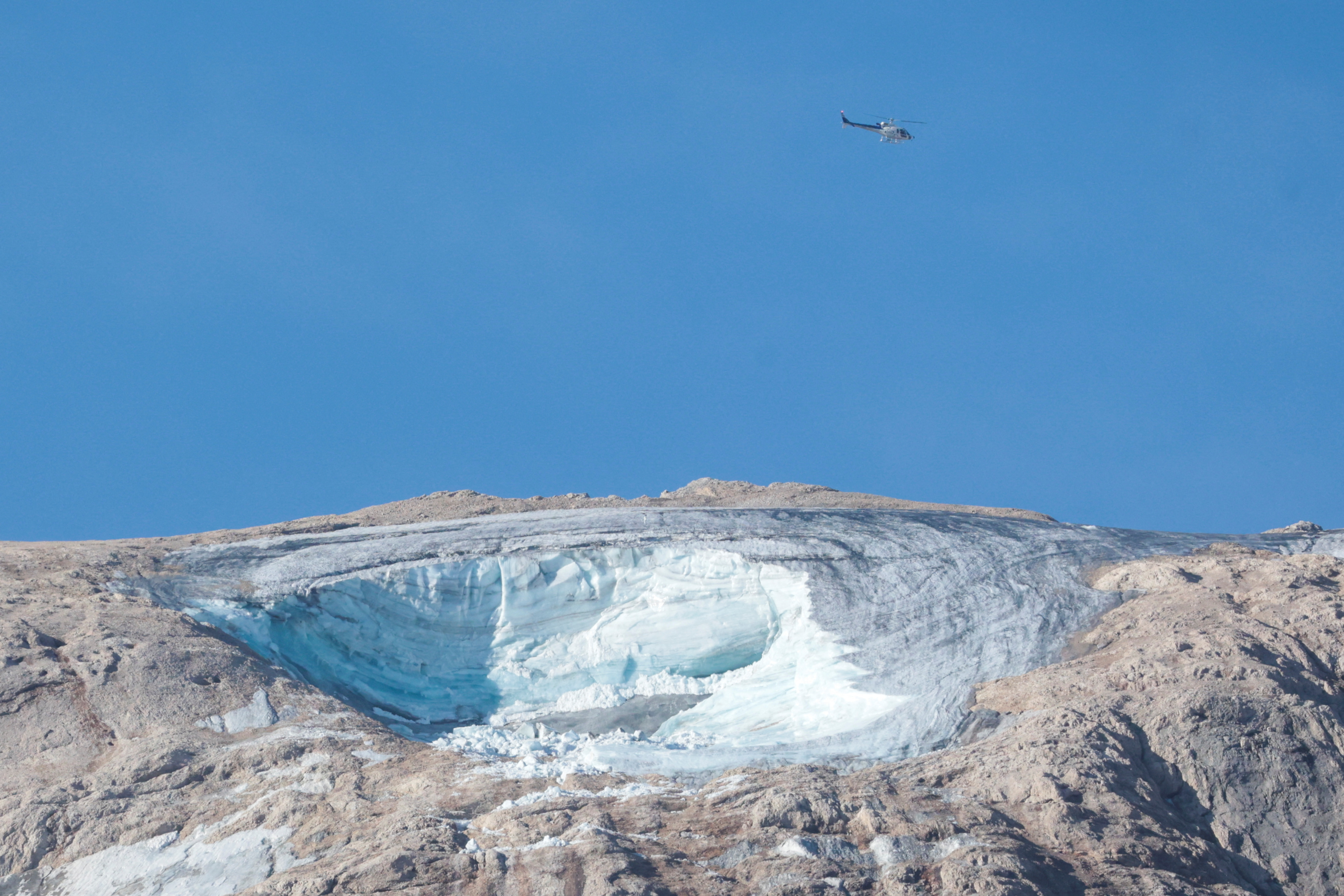 A glacier collapses in the Italian Alps, in Marmolada