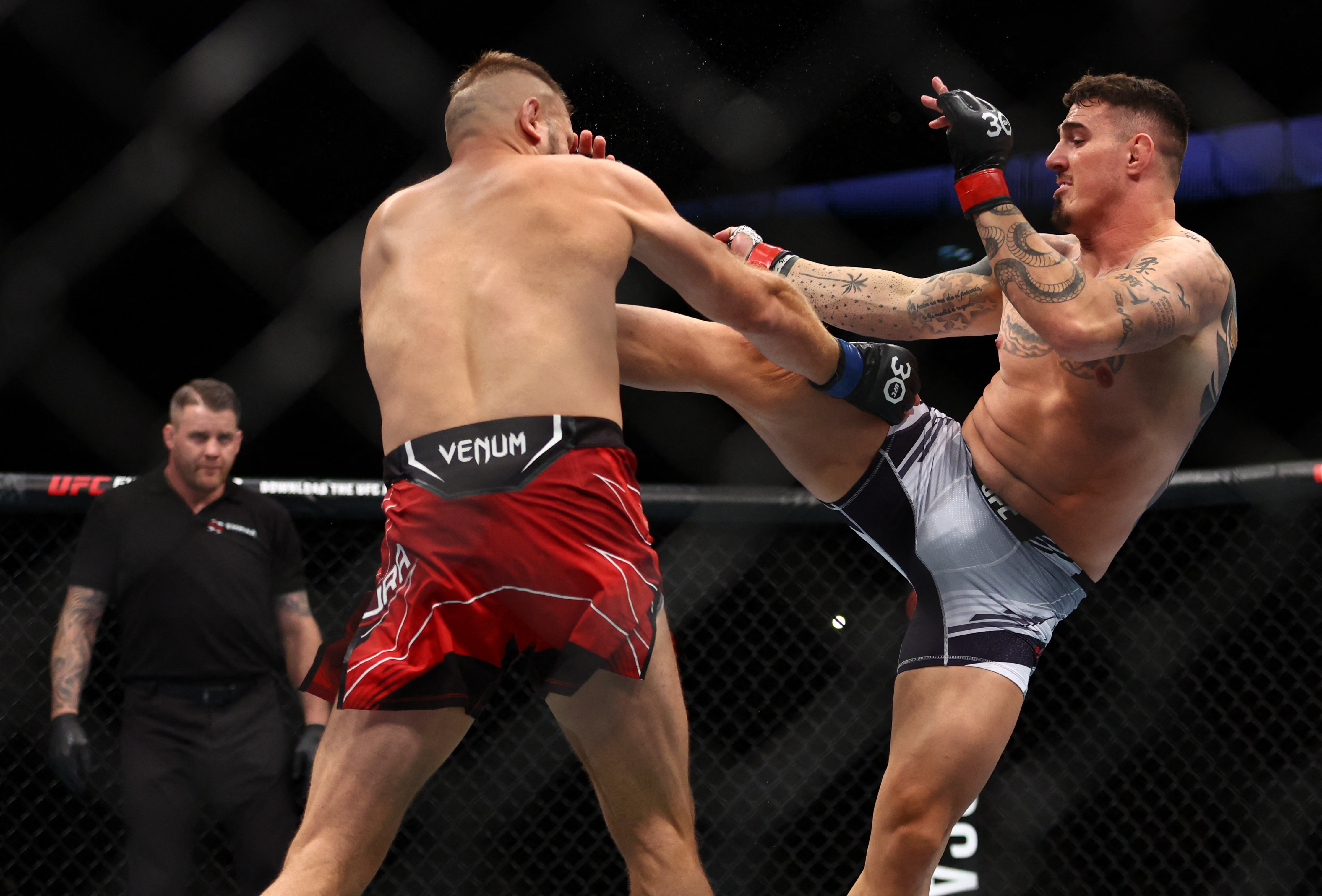 Aspinall KOs Tybura, sets sights on UFC heavyweight title