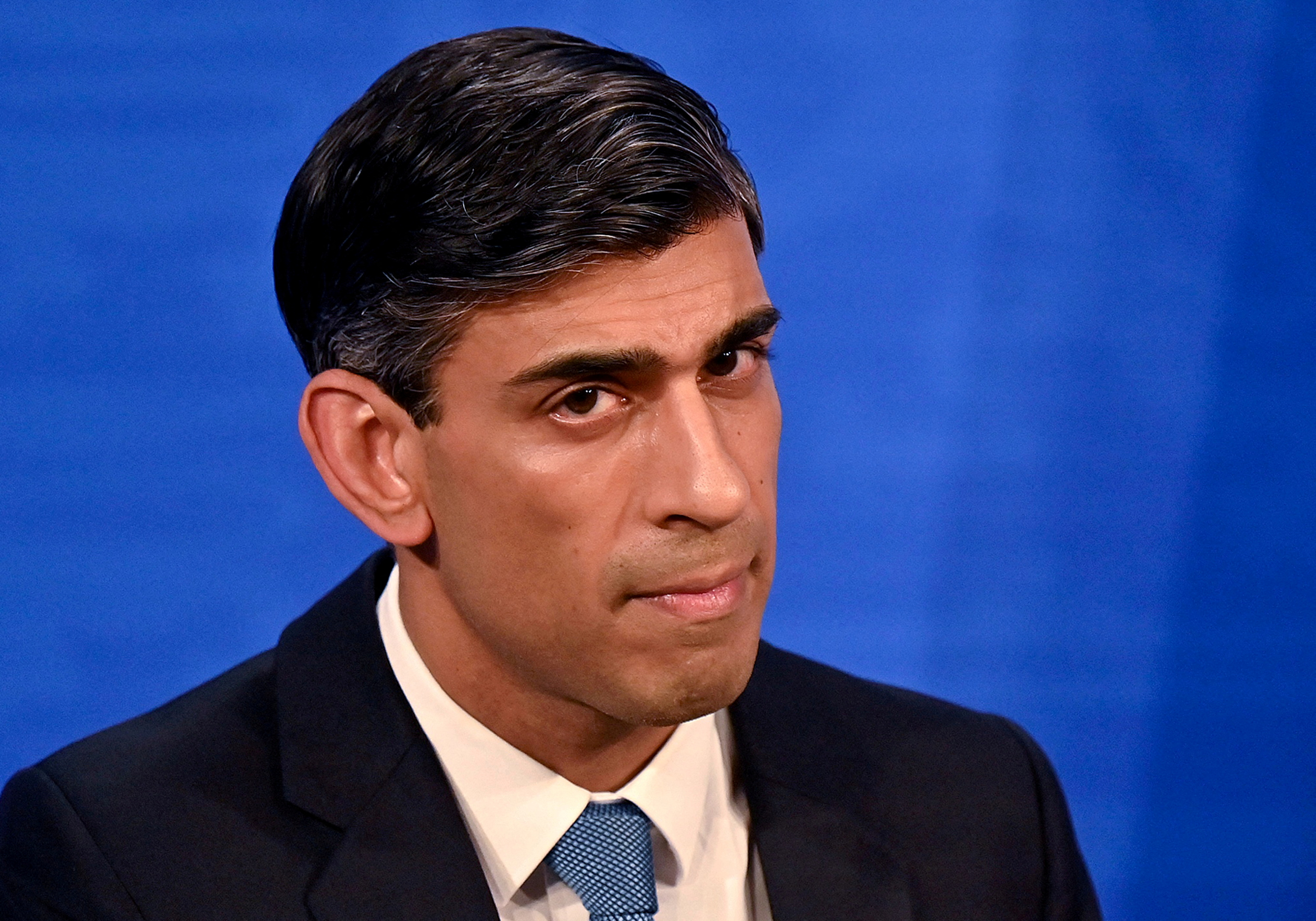 Britain's Chancellor of the Exchequer Rishi Sunak hosts a news conference in the Downing Street Briefing Room in London
