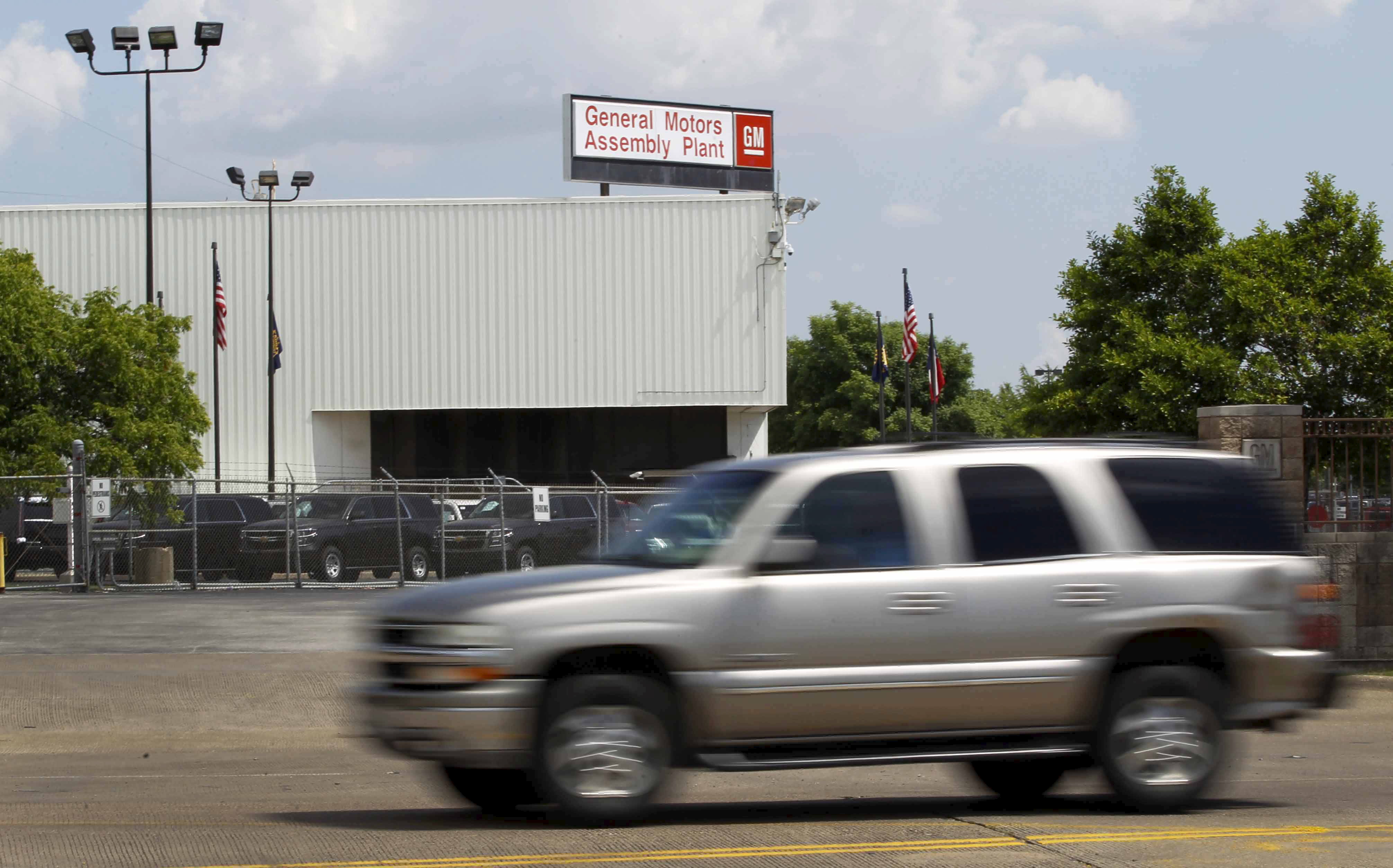 Chevrolet Suburban drives past the General Motors Assembly Plant in Arlington, Texas