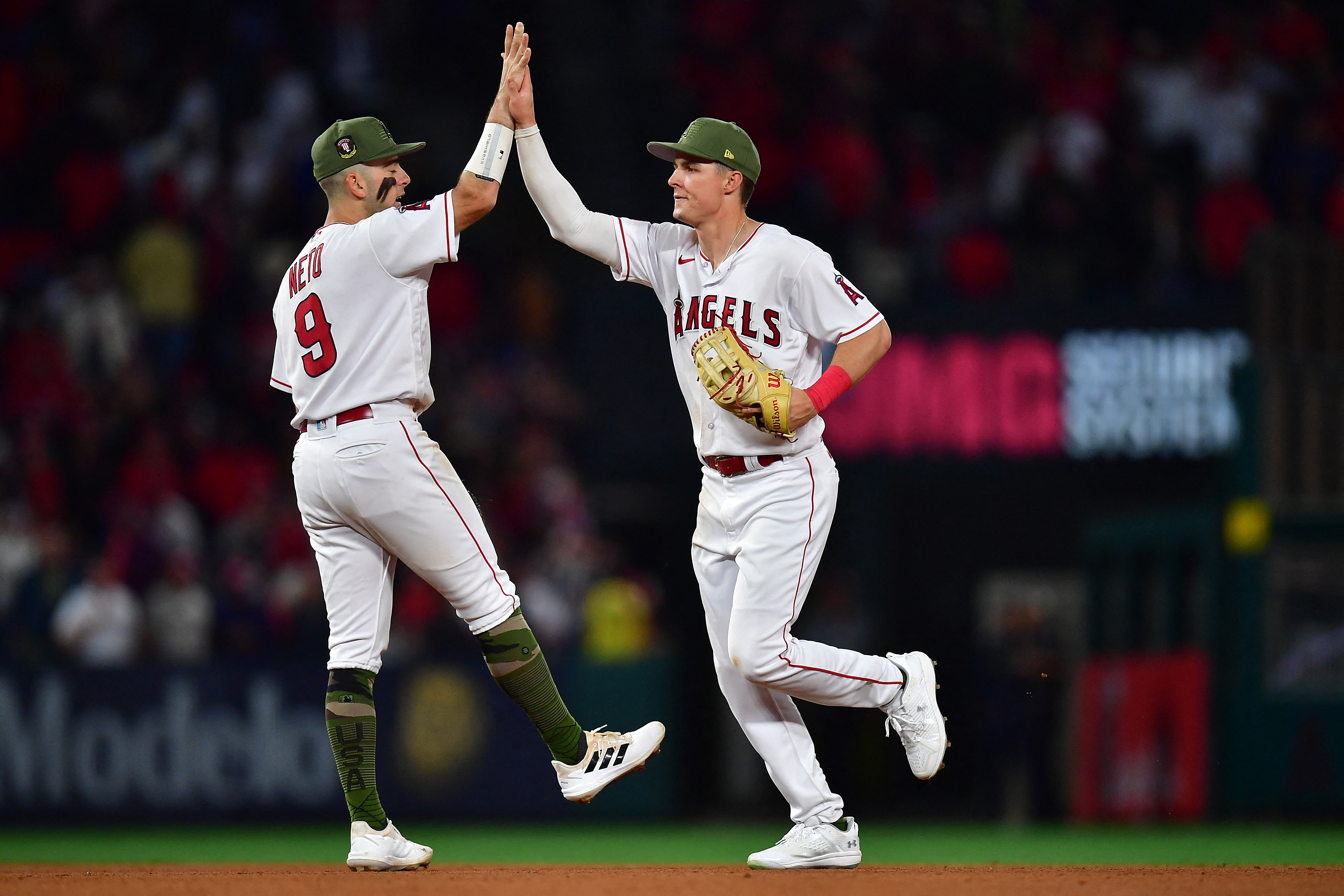 ANAHEIM, CA - MAY 19: Los Angeles Angels center fielder Mickey Moniak (16)  running towards first base during an MLB baseball game against the  Minnesota Twins played on May 19, 2023 at