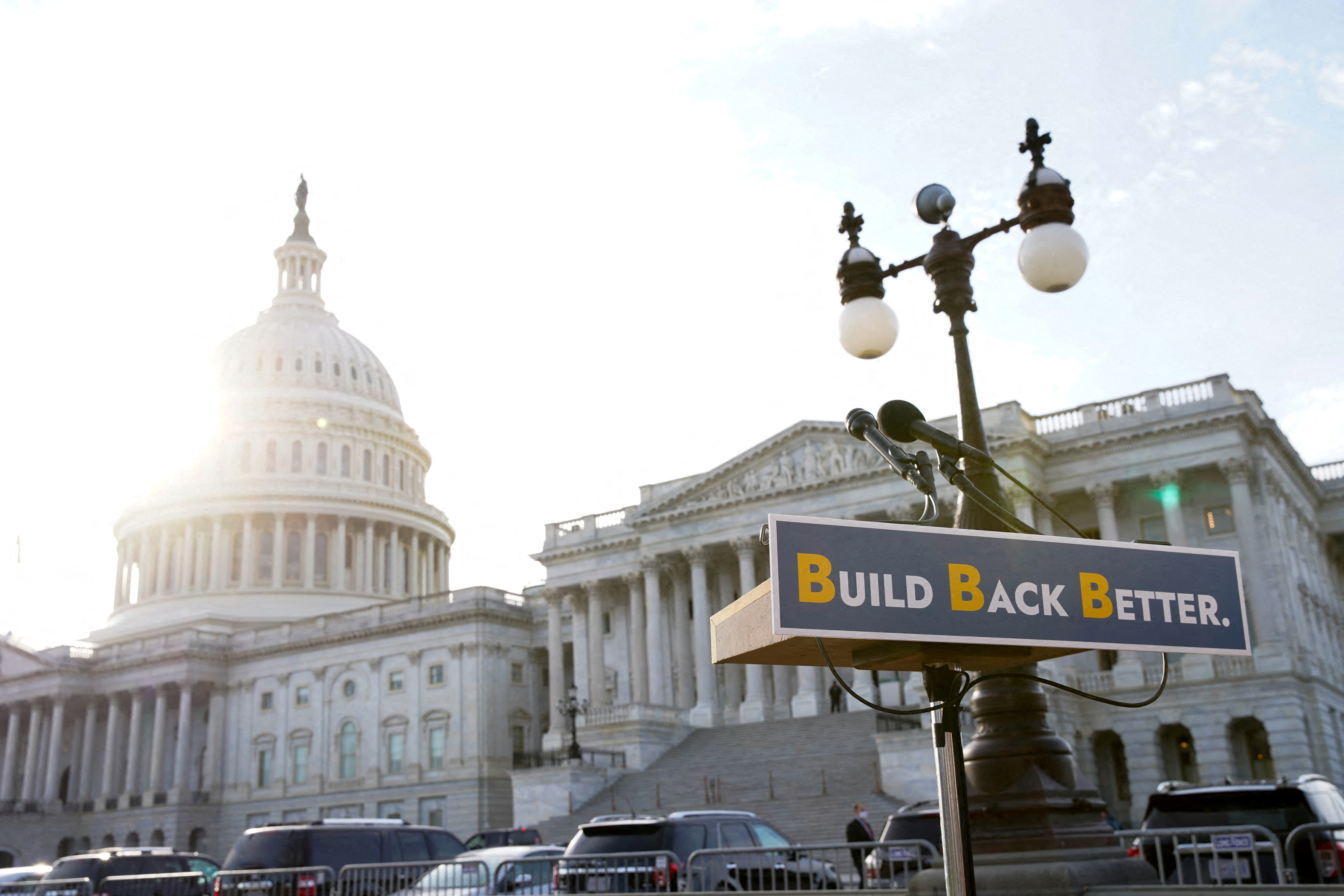 A lectern is seen before the start of a media event about the Build Back Better package with Senate Democrats outside the U.S. Capitol in Washington, December 15, 2021. REUTERS/Elizabeth Frantz/File Photo