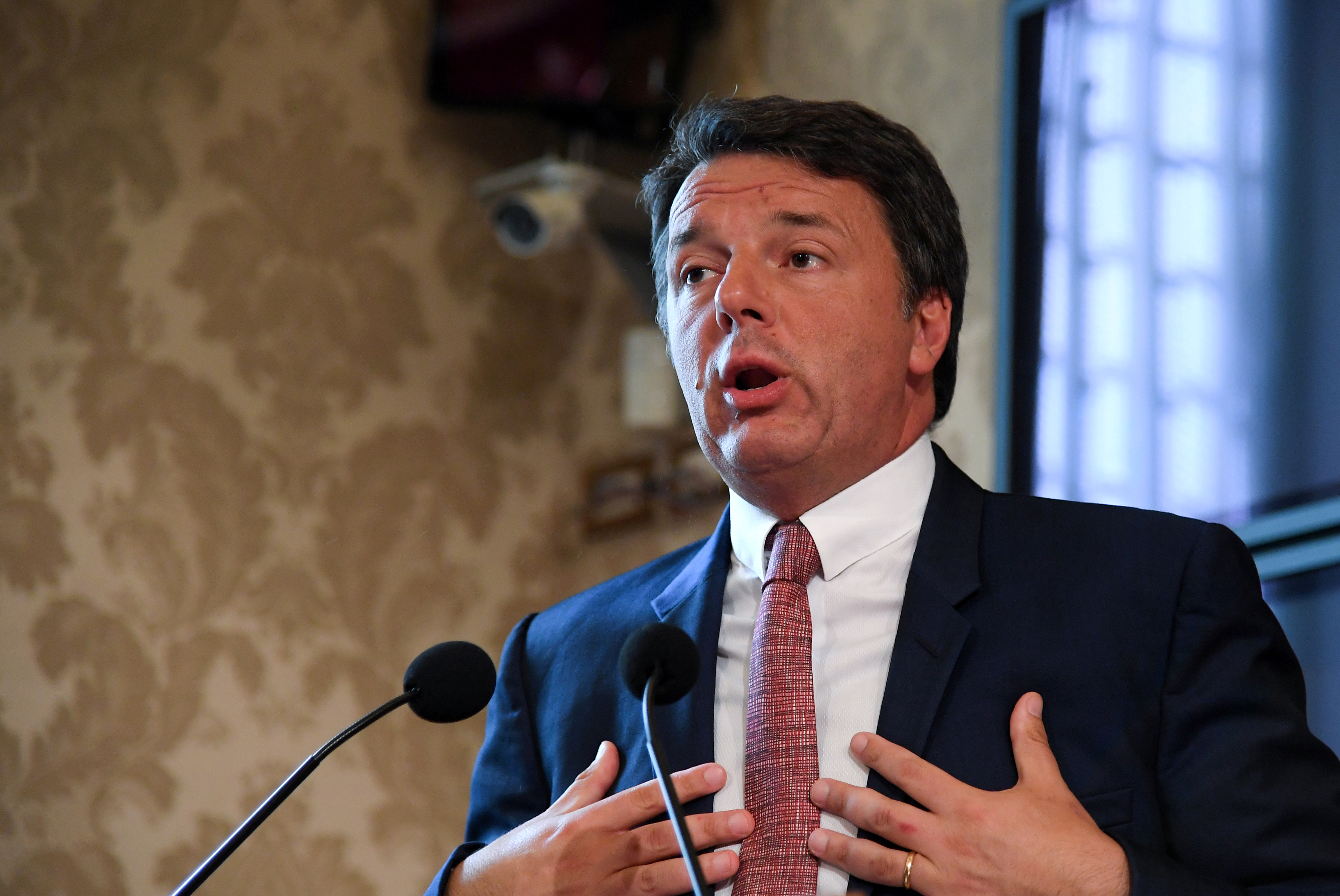 Former Italian Prime Minister Matteo Renzi speaks at a news conference regarding his proposal for a transitional Italian government in Rome, Italy, August 13, 2019. REUTERS/Alberto Lingria/File Photo