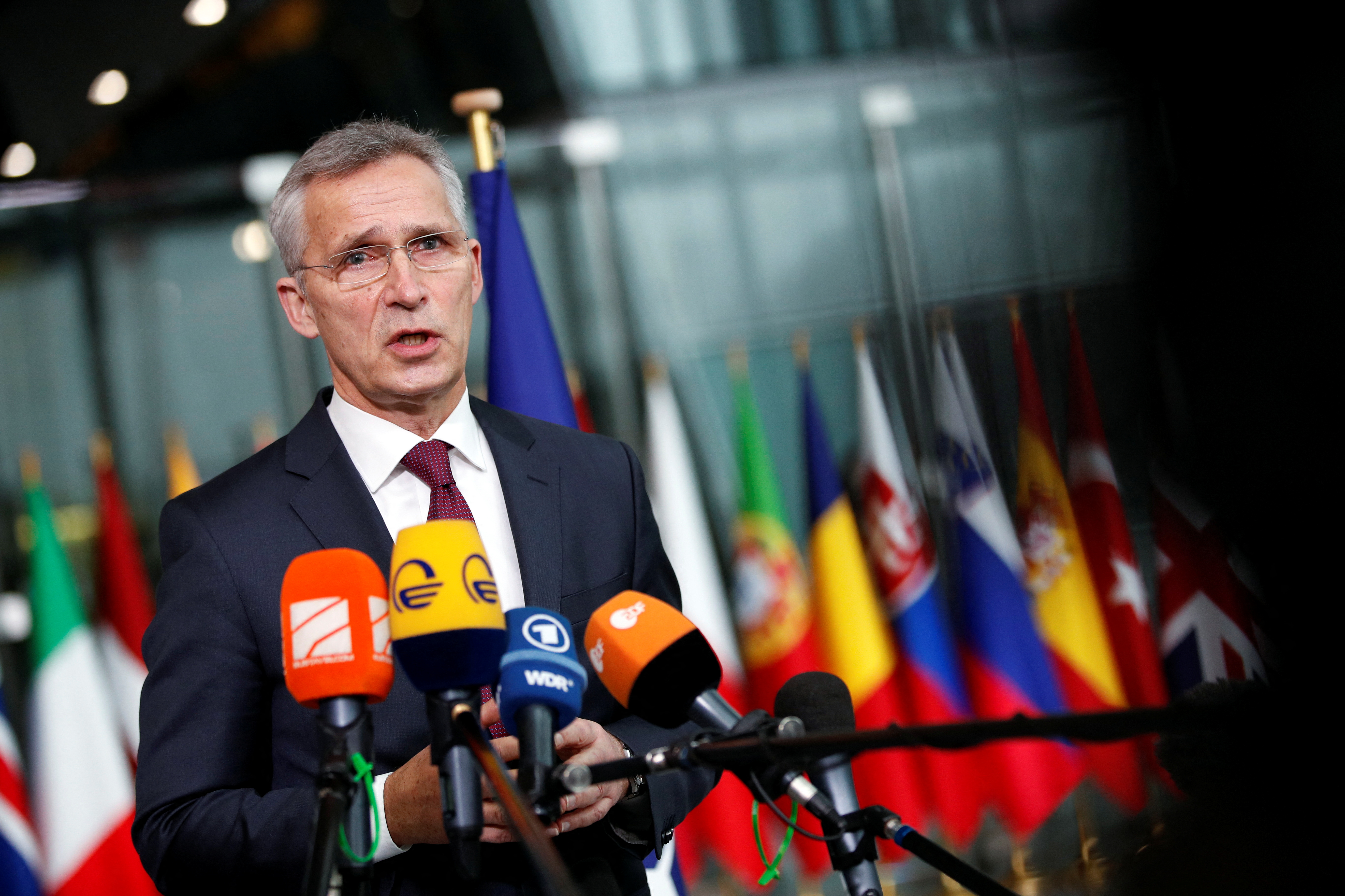 NATO Secretary-General Jens Stoltenberg speaks ahead of a NATO Defense Ministers meeting in Brussels, Belgium, February 16, 2022. REUTERS/Johanna Geron