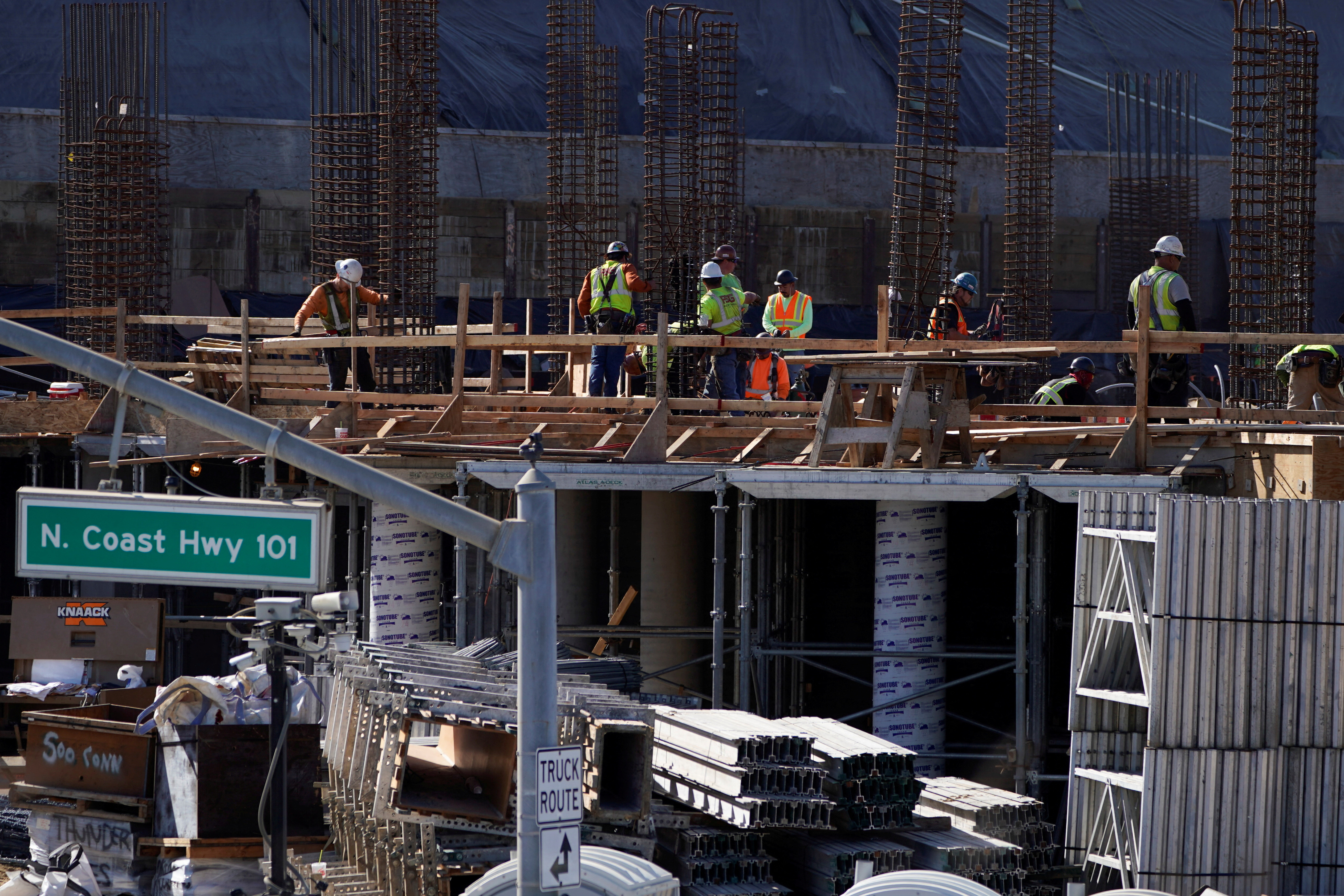 Work crews construct a new hotel complex on oceanfront property in Encinitas, California