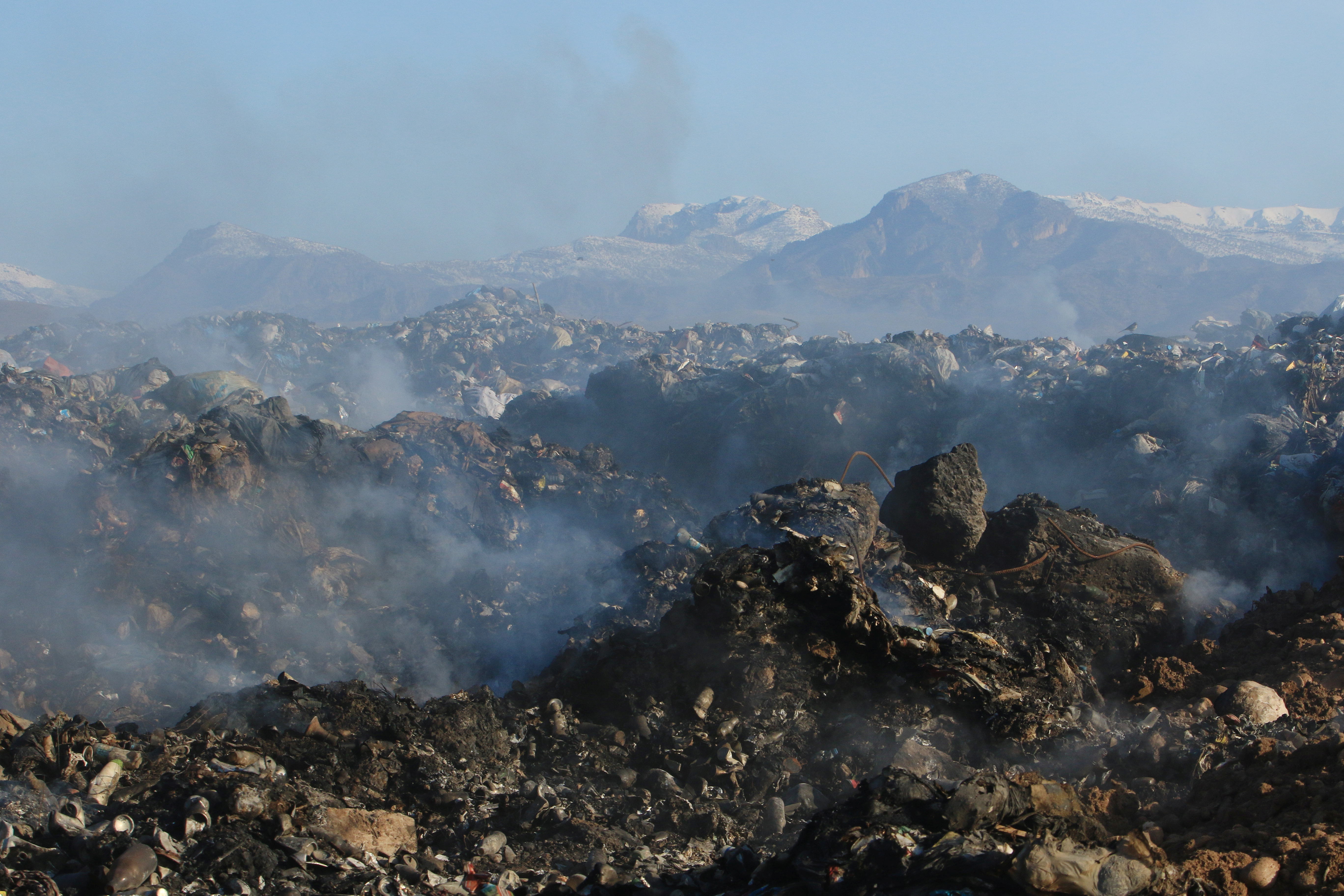 Garbage is seen collected from an area which used to be a landfill and will be diverted into a green park, in Zakho, district of Dohuk