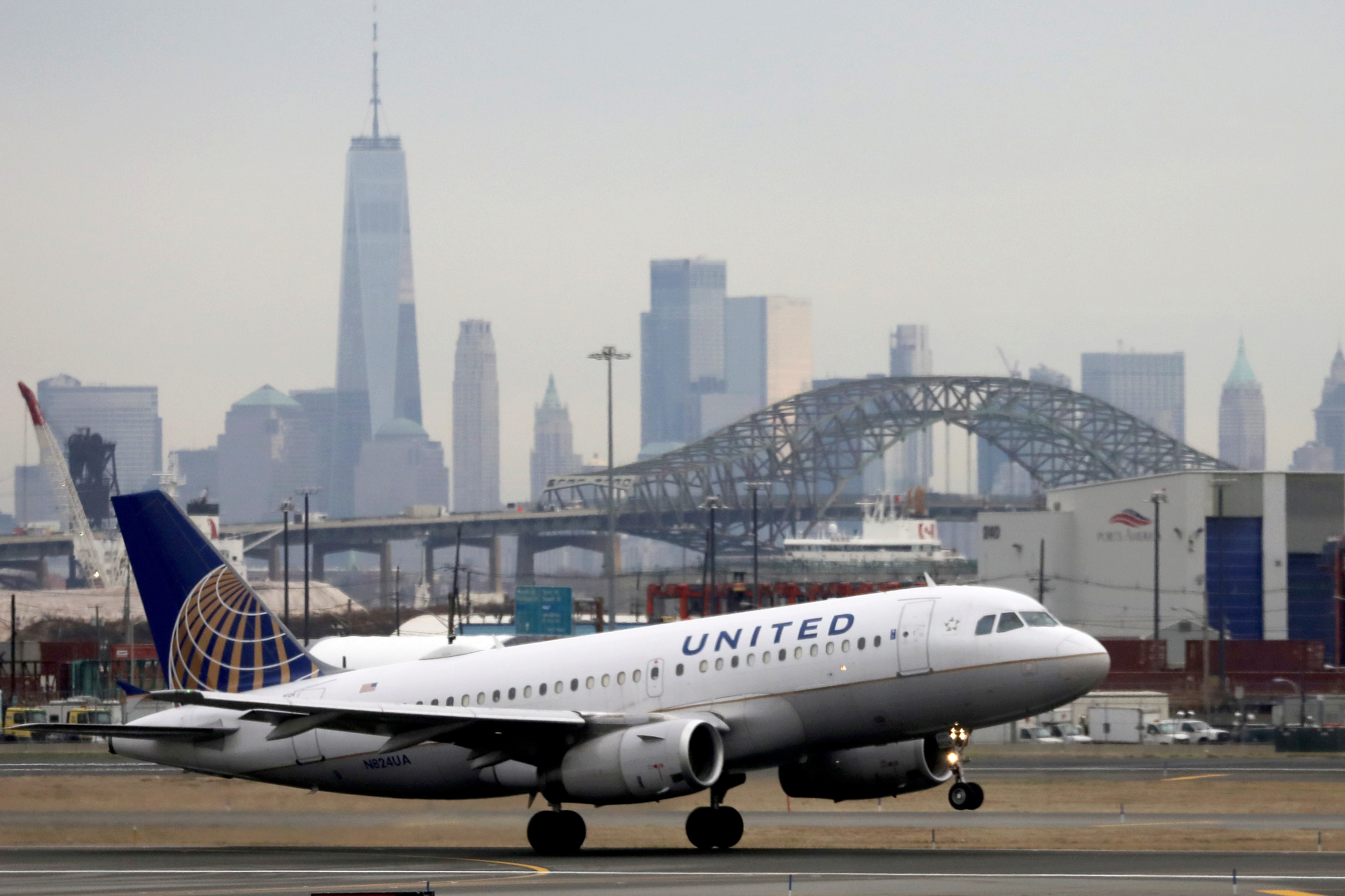 A United Airlines passenger jet takes off with New York City as a backdrop, at Newark Liberty International Airport, New Jersey, U.S. December 6, 2019. REUTERS/Chris Helgren