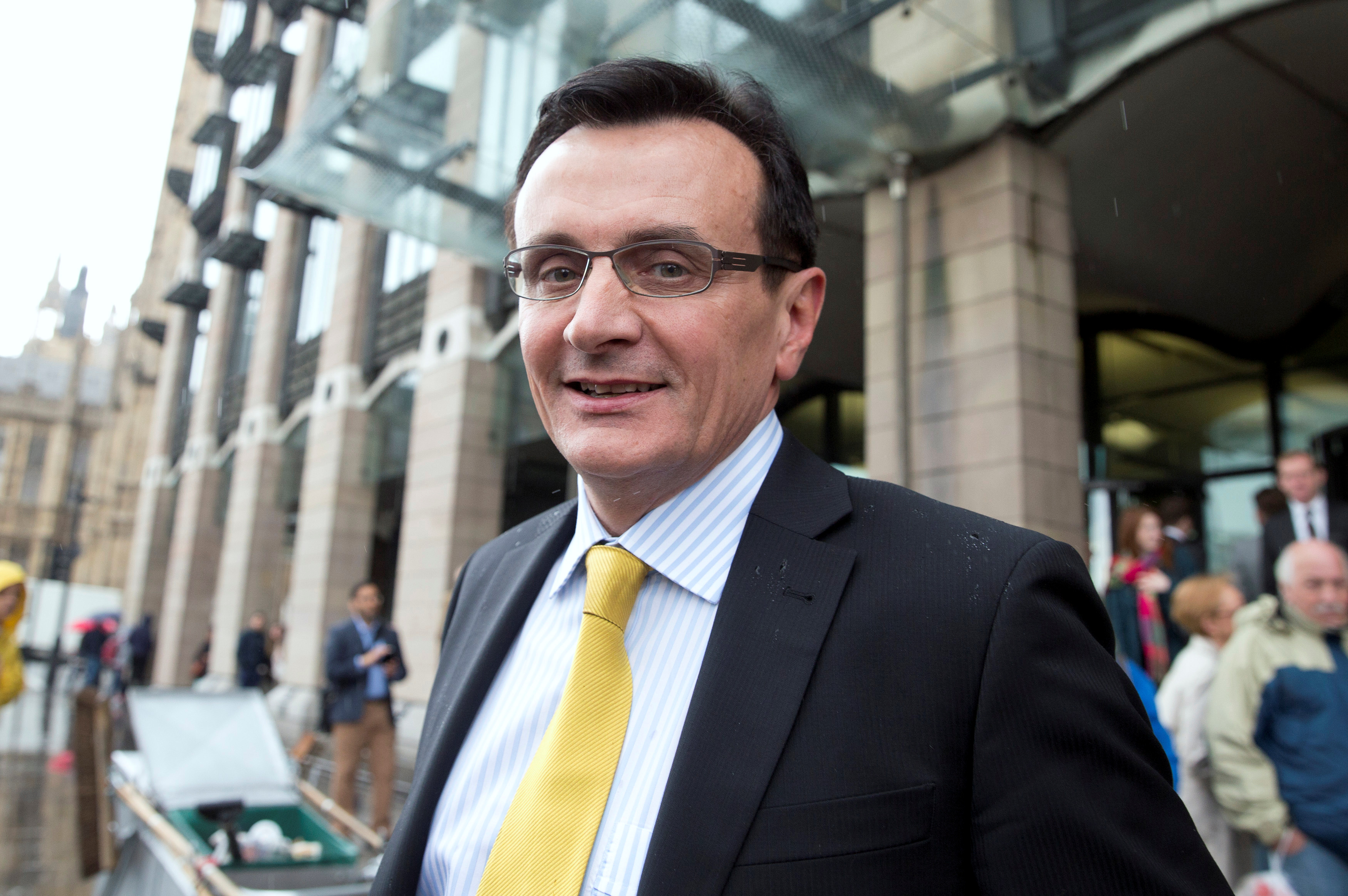 Chief Executive of AstraZeneca Pascal Soriot leaves after appearing at a parliamentary business and enterprise committee hearing at Portcullis House in London