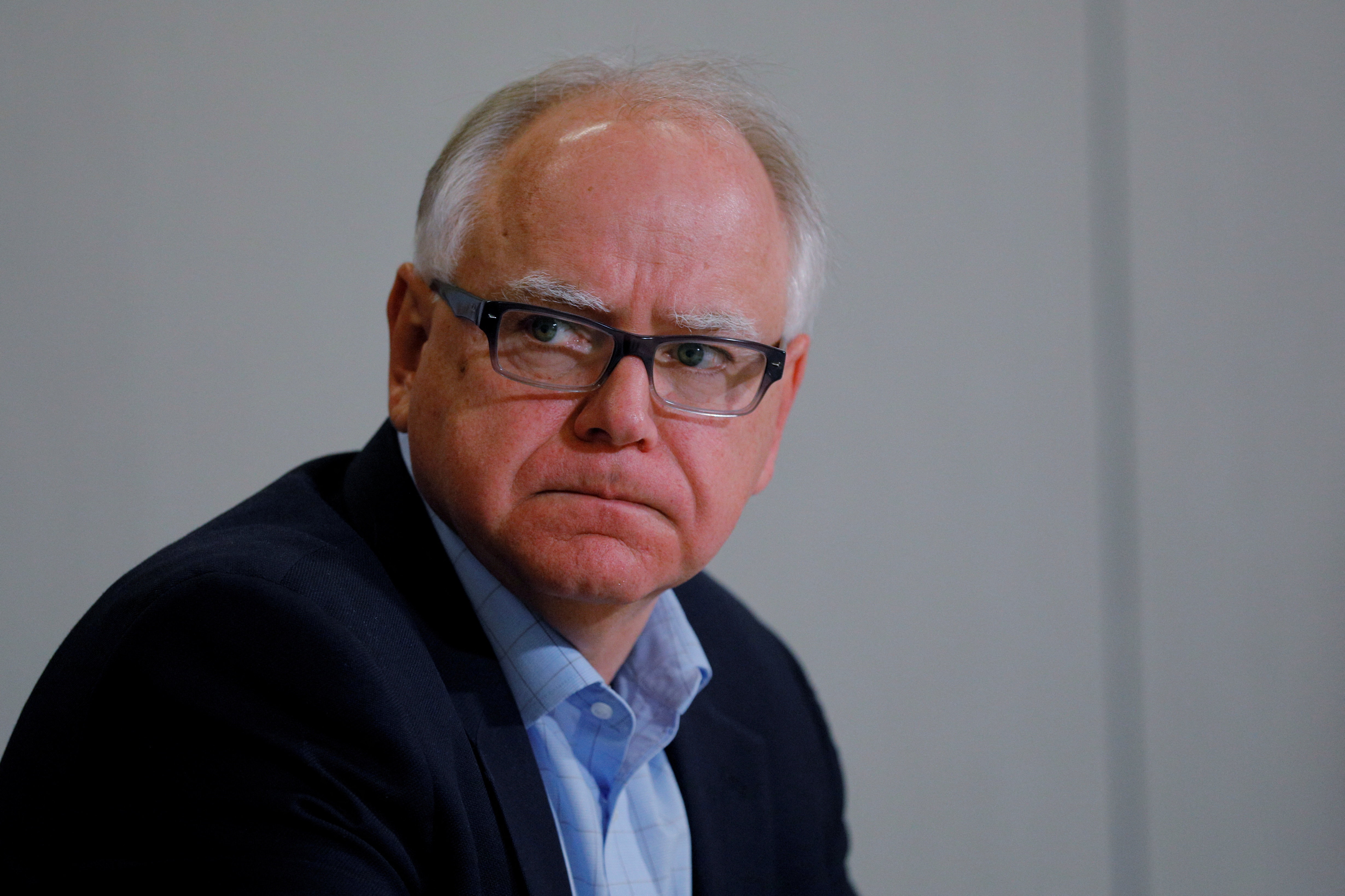 Democratic candidate for Governor Tim Walz participates in a gun violence prevention roundtable with former Representative Gabby Giffords in Minneapolis