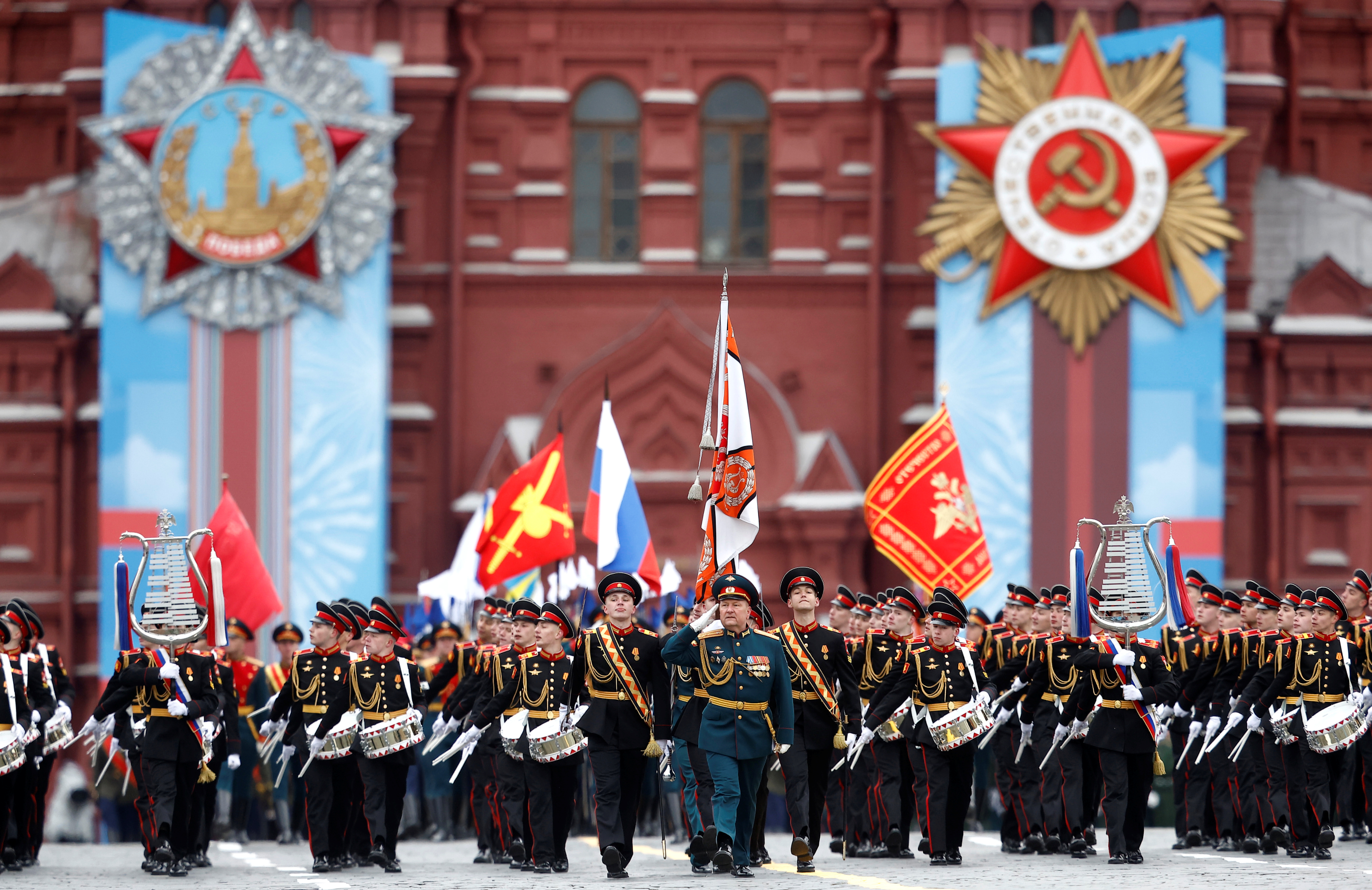 Russian service members and cadets march during a military parade on Victory Day, which marks the 76th anniversary of the victory over Nazi Germany in World War Two, in Red Square in central Moscow, Russia May 9, 2021. REUTERS/Maxim Shemetov