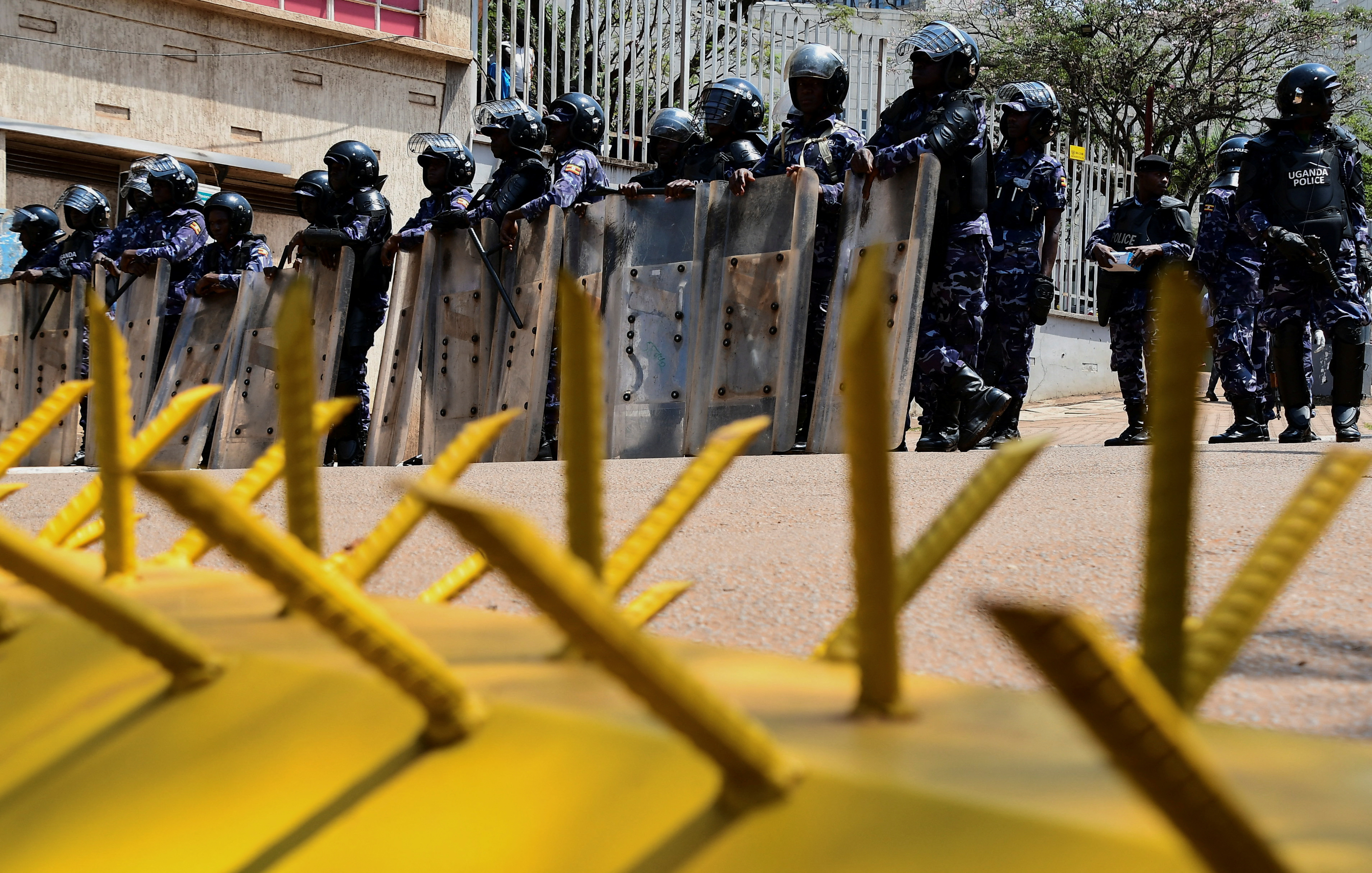 Ugandan security forces detain dozens of young protesters, says rights  group | Reuters