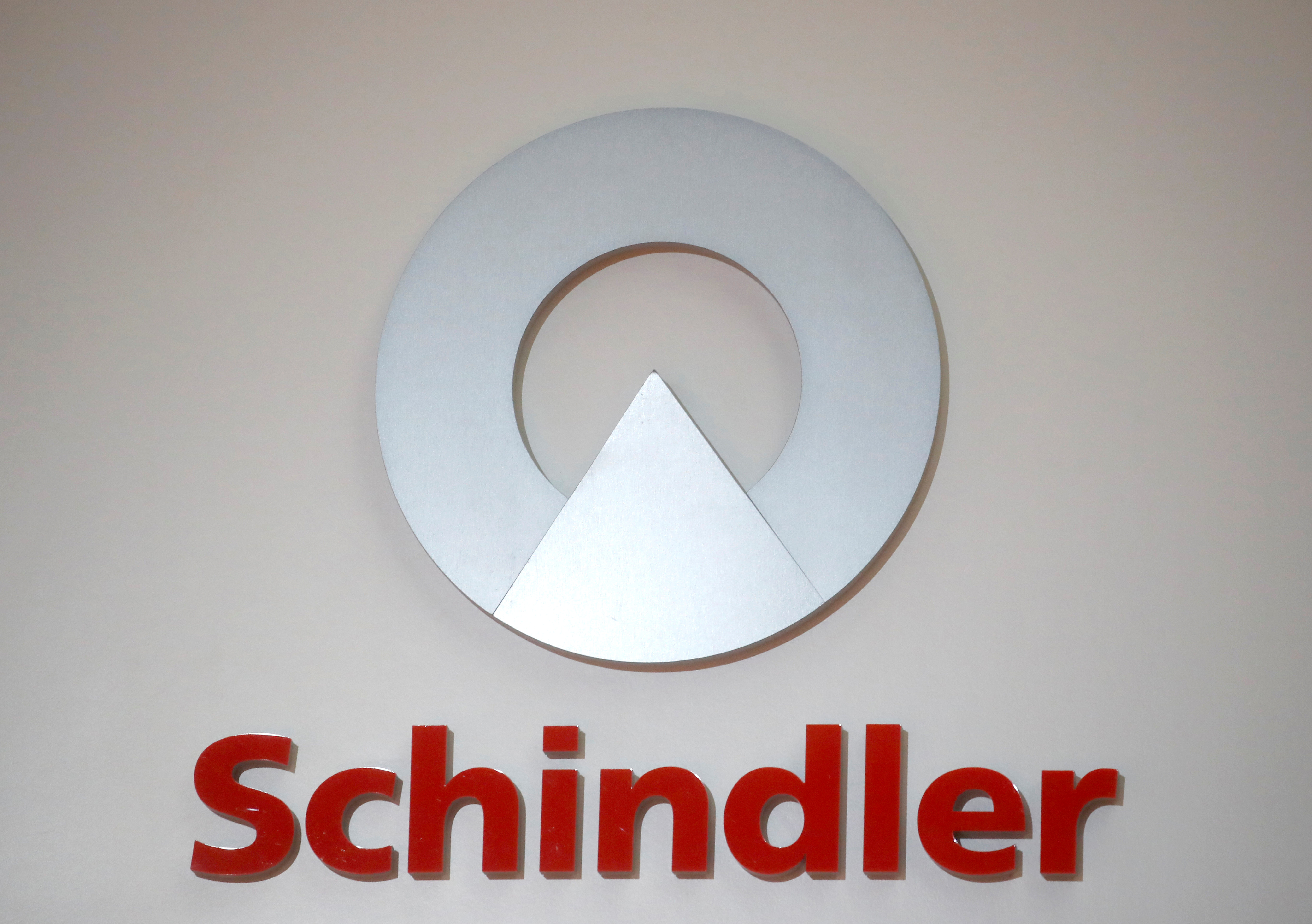 The logo of Swiss elevator maker Schindler is seen during the annual news conference in Zurich, Switzerland February 14, 2020. REUTERS/Arnd Wiegmann/File Photo
