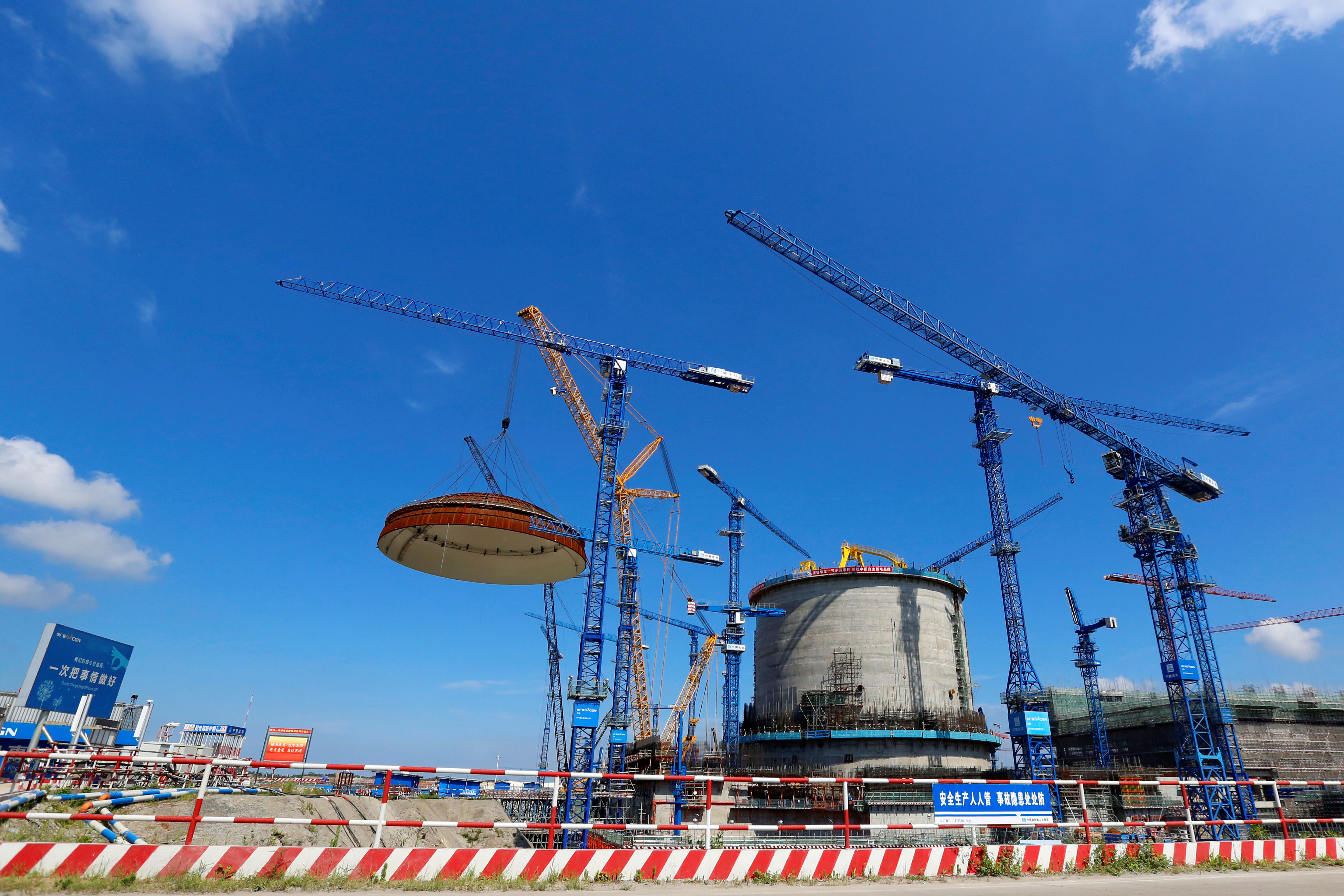 Dome is installed over a Hualong One nuclear power unit at Fangchenggang nuclear power plant in Guangxi